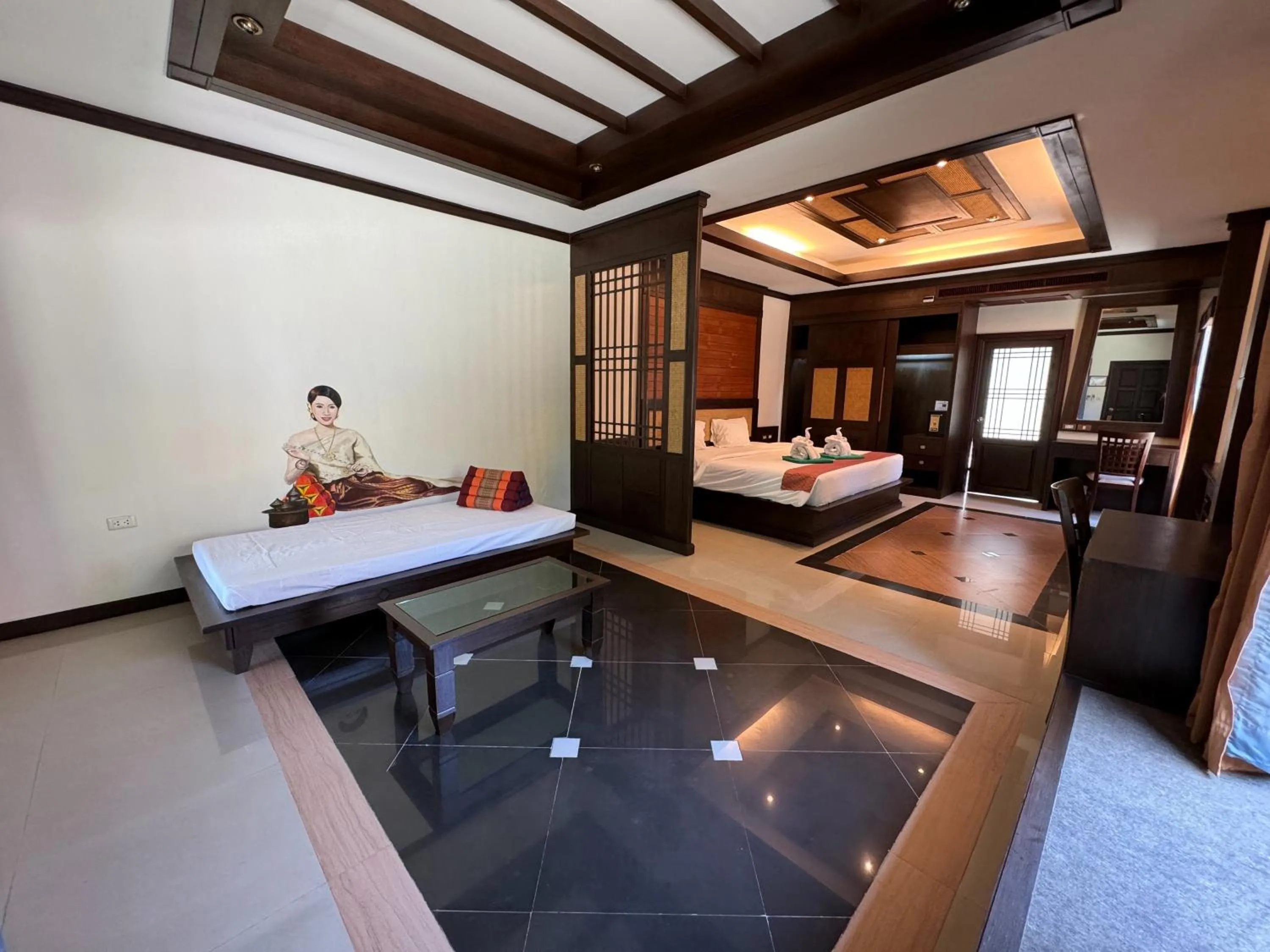 Bed in Hotel and Beach Bungalow at Lanta Resort