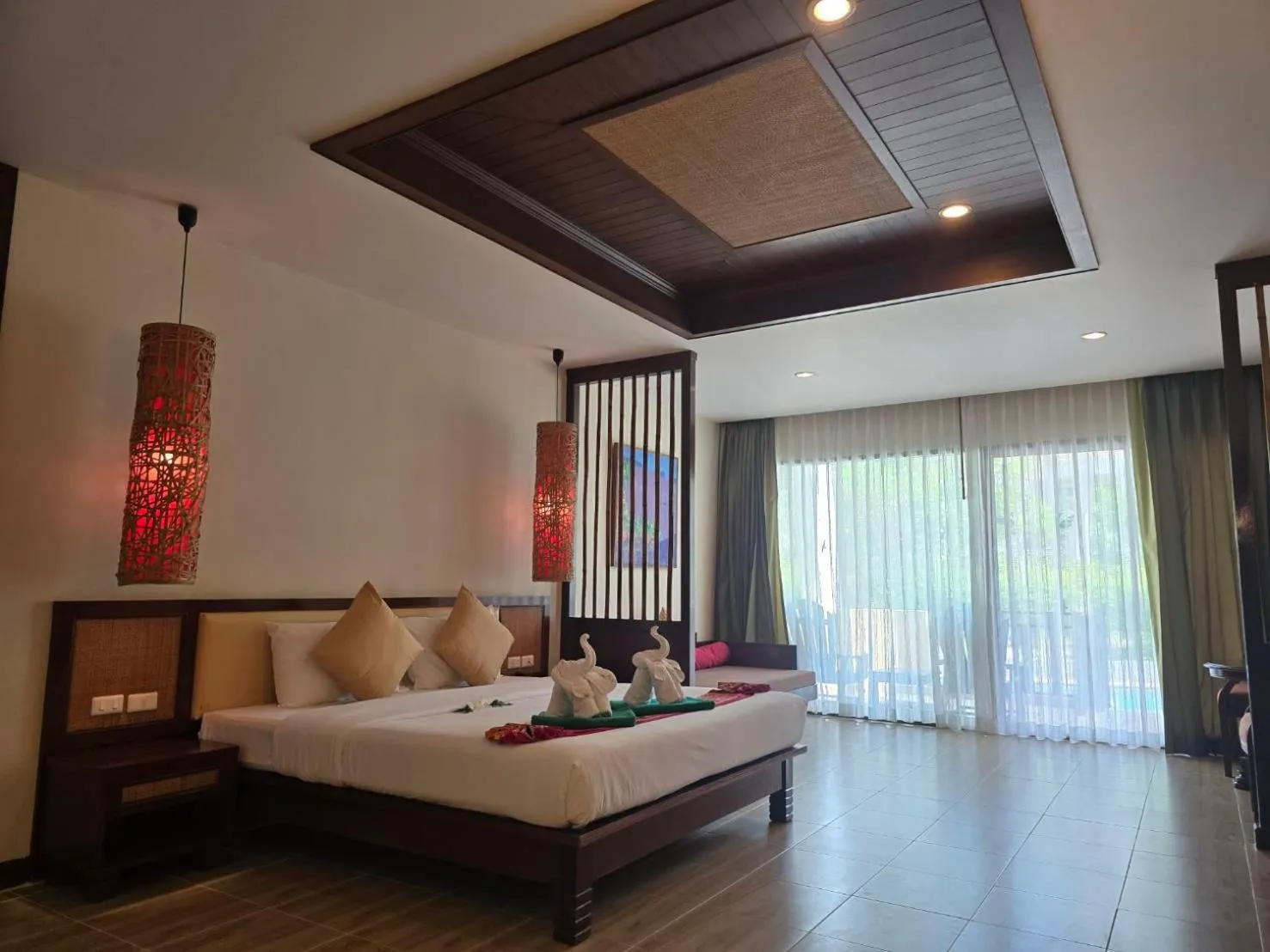 Bed in Hotel and Beach Bungalow at Lanta Resort