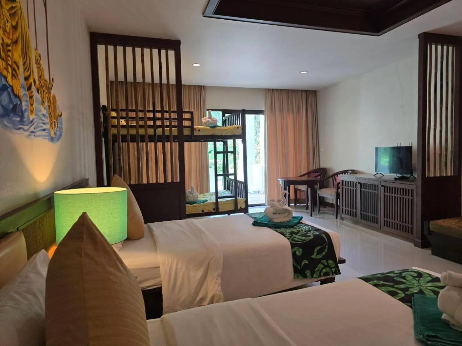 Bed in Hotel and Beach Bungalow at Lanta Resort