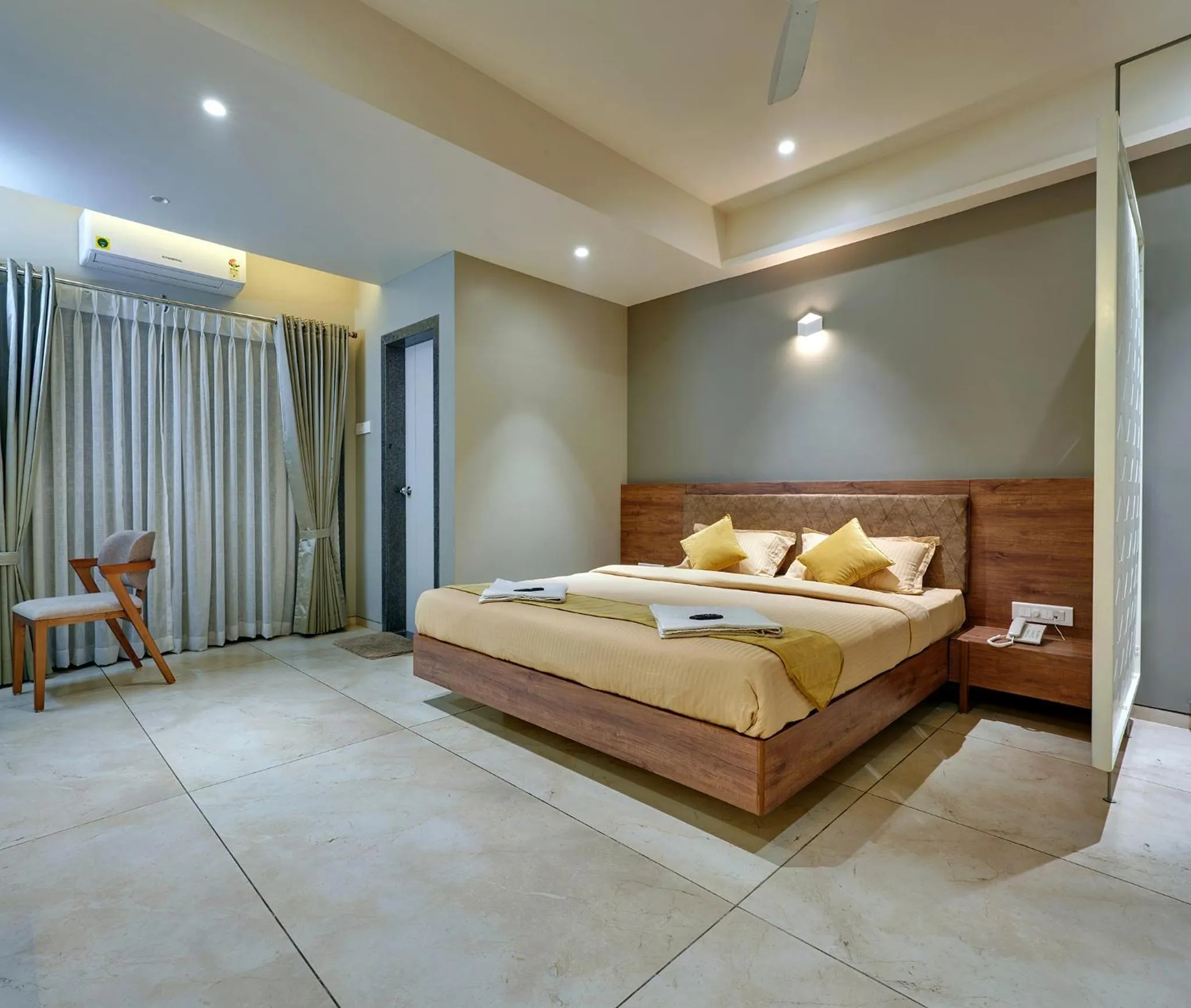 Photo of the whole room, Bed in Hotel Swamini Kolhapur