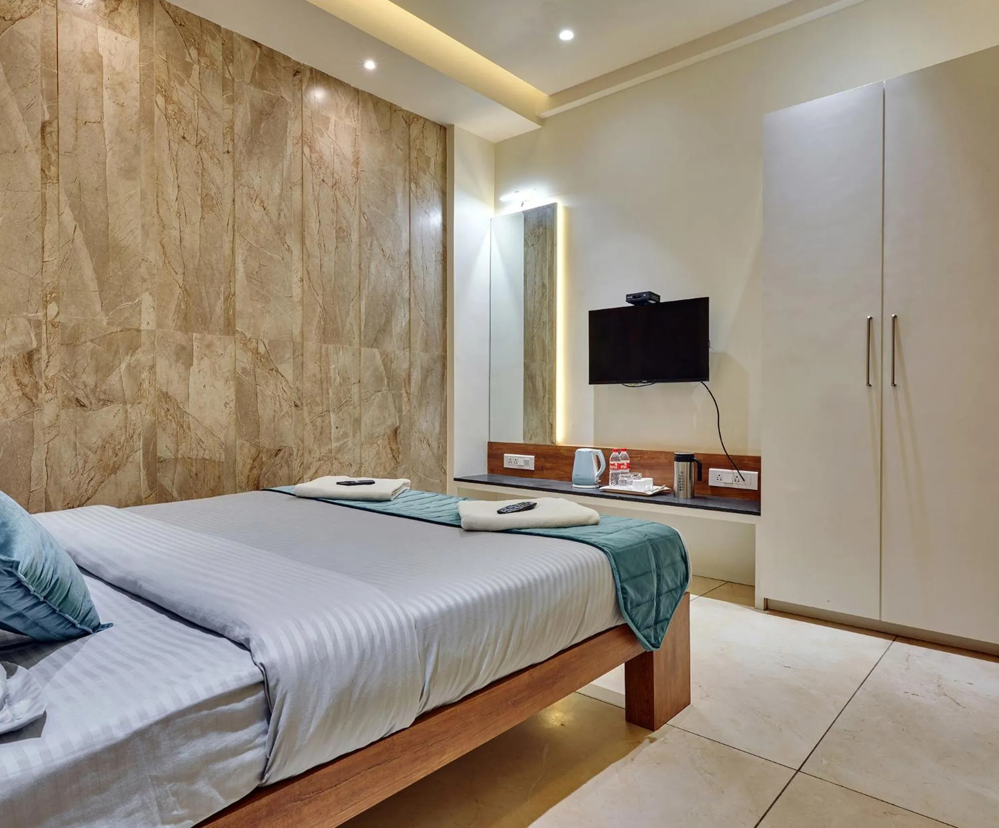 Bedroom, Bed in Hotel Swamini Kolhapur