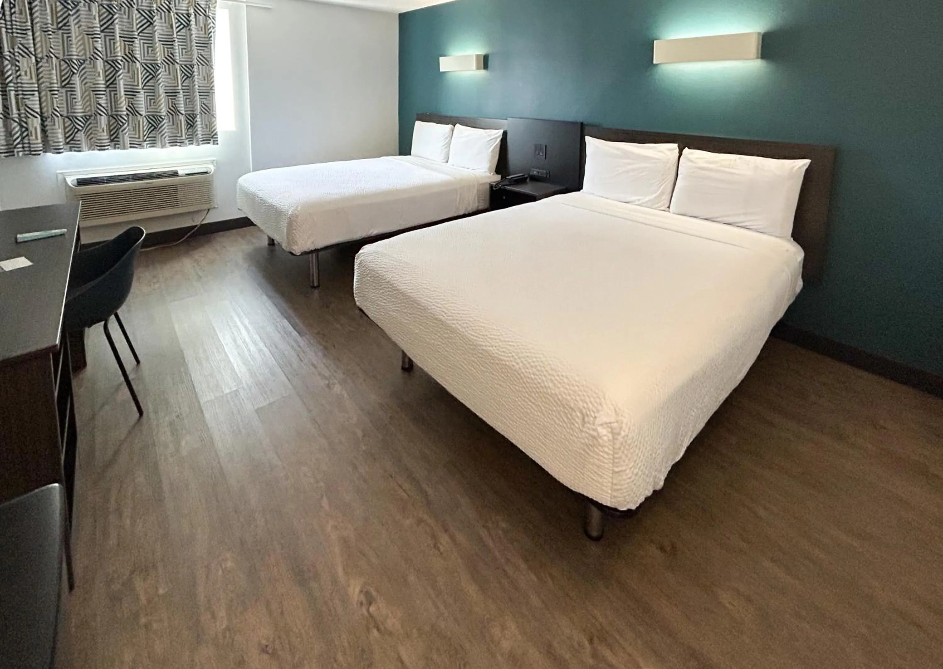 Bedroom, Bed in Studio 6 Suites Carson, CA