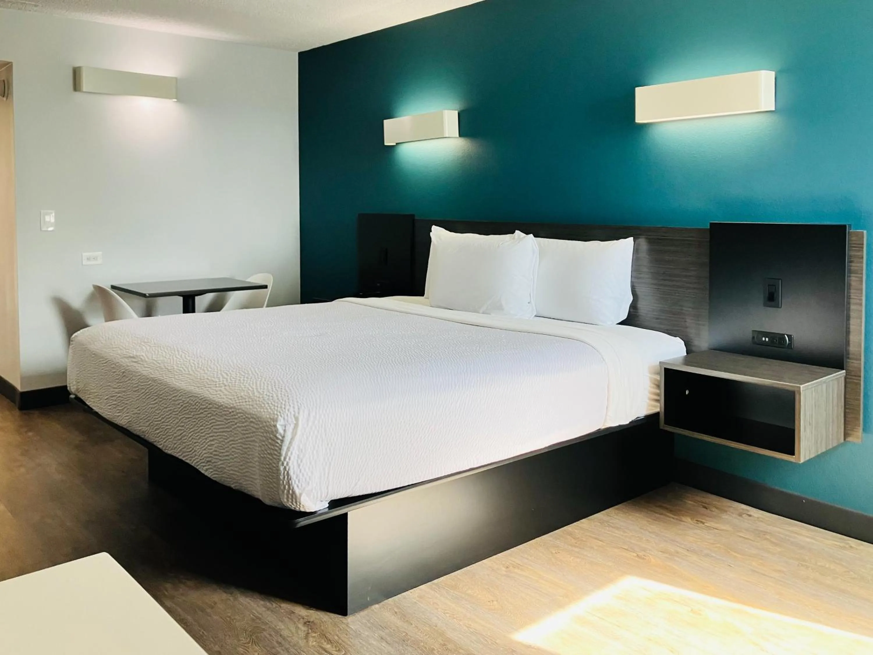 Bedroom, Bed in Studio 6 Suites Carson, CA