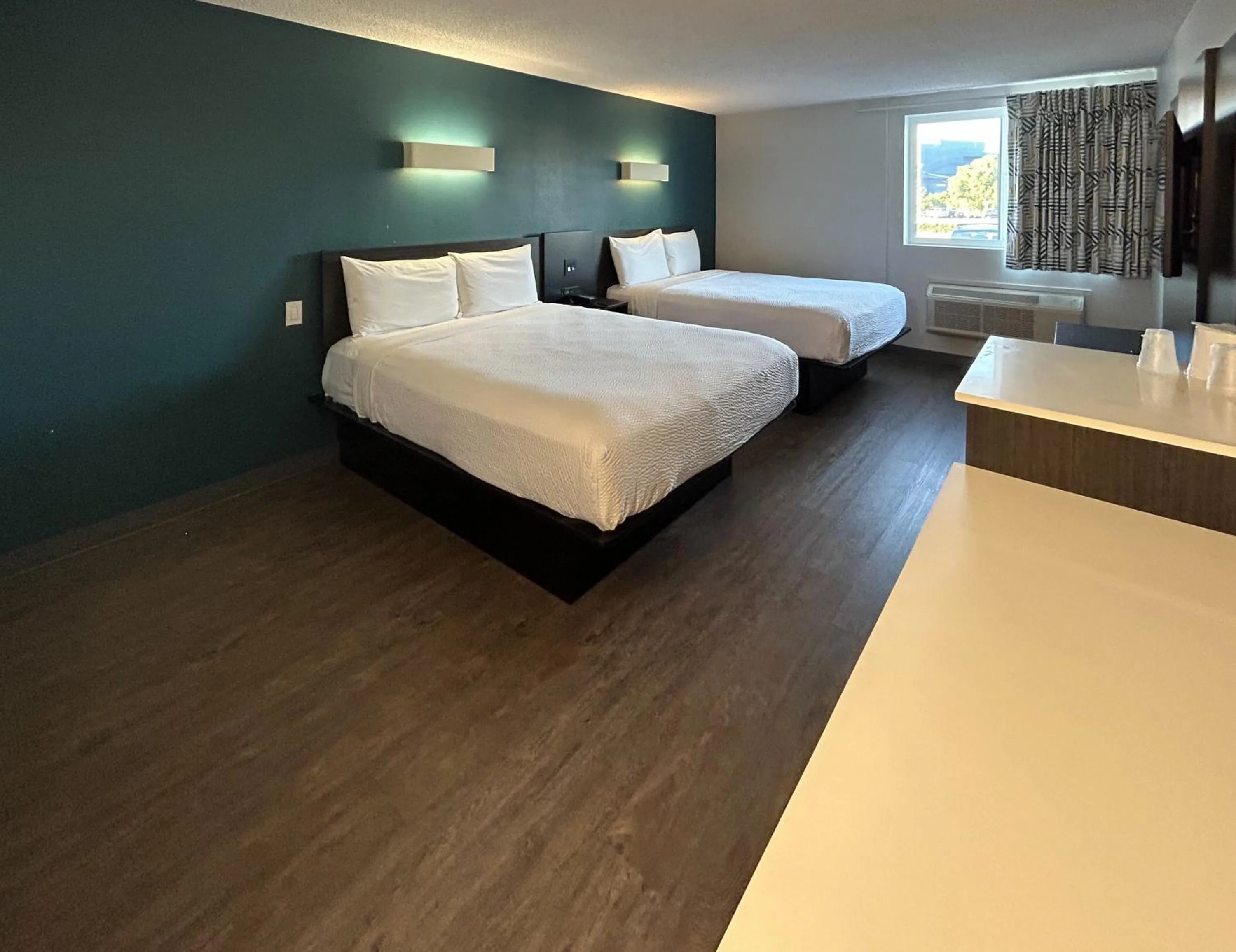 Bedroom, Bed in Studio 6 Suites Carson, CA