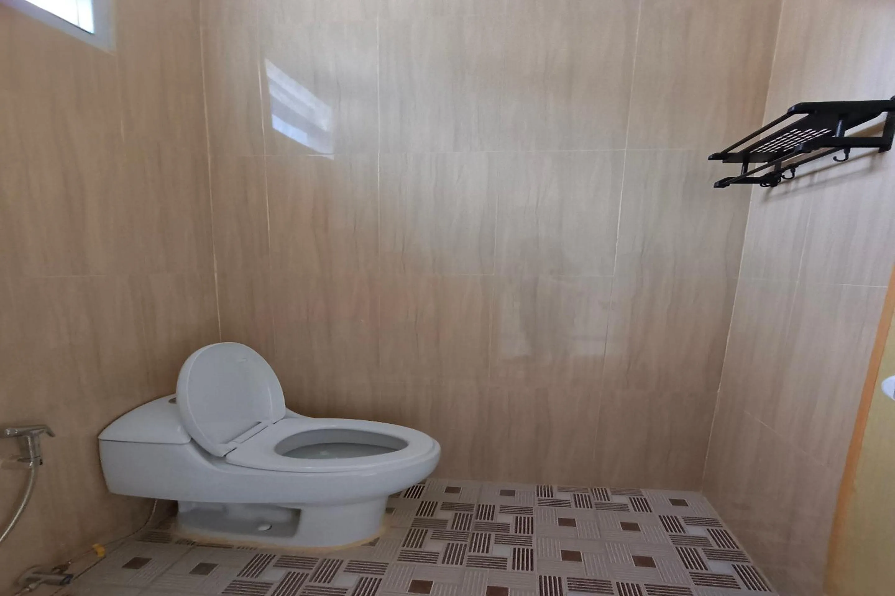 Bathroom in Hotel O Merah House