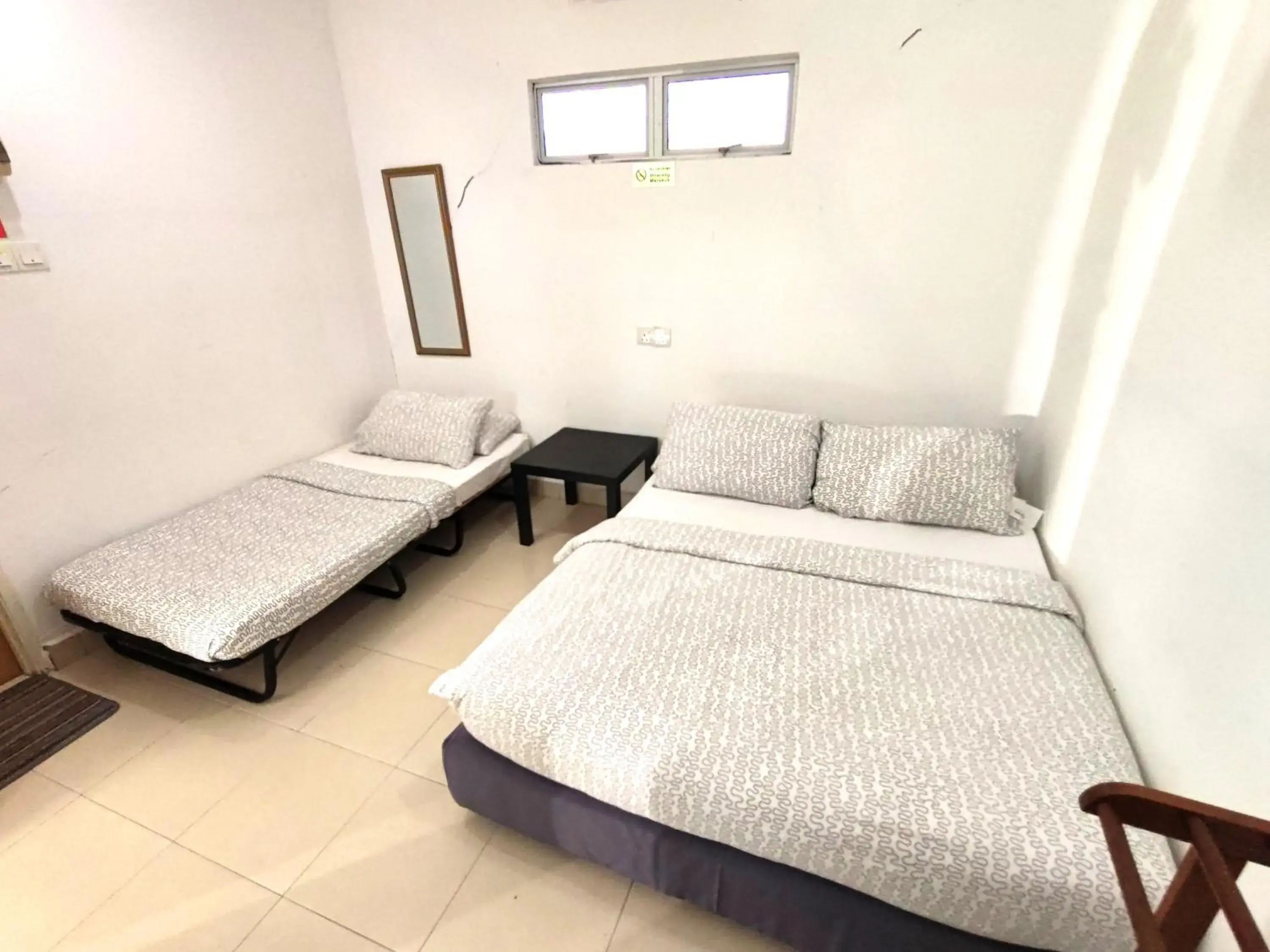 Deluxe Twin Room in OYO 90879 Eleven Inn Deluxe Twin Room in OYO 90879 Eleven Inn