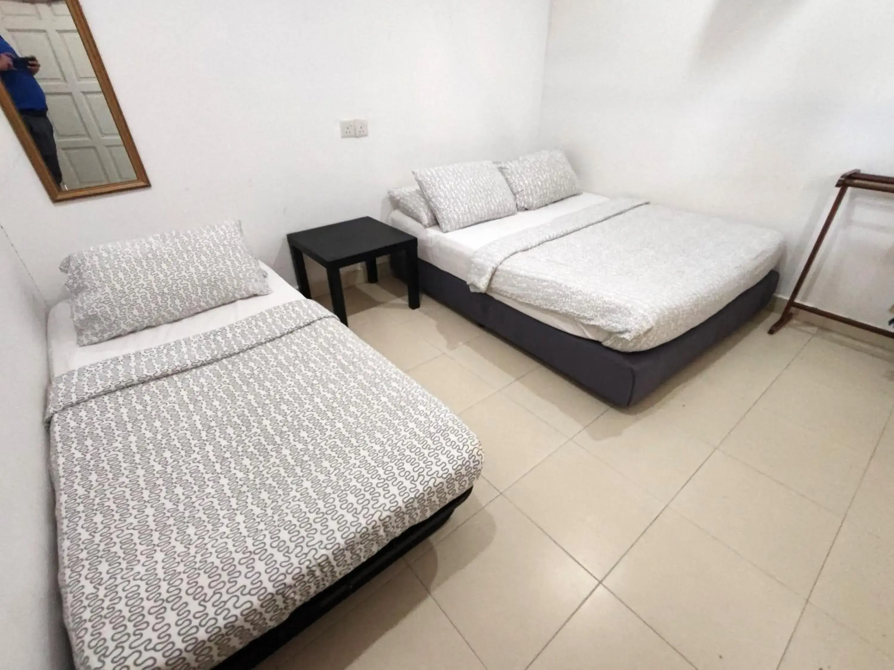 Deluxe Triple Room in OYO 90879 Eleven Inn Deluxe Triple Room in OYO 90879 Eleven Inn