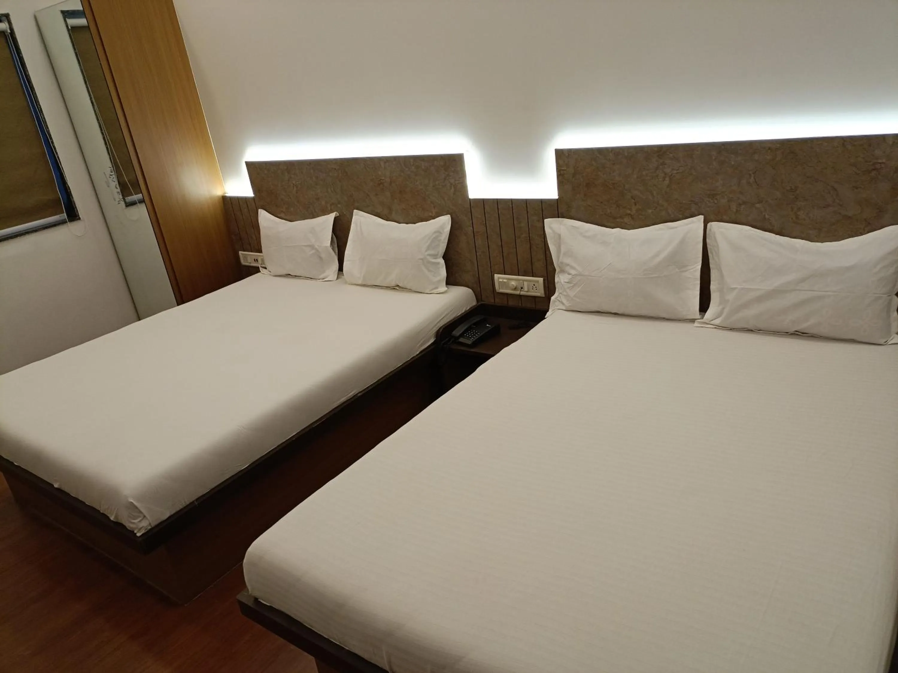 Bedroom, Bed in Hotel Ritz Vesu - Hotels in Vesu, Surat