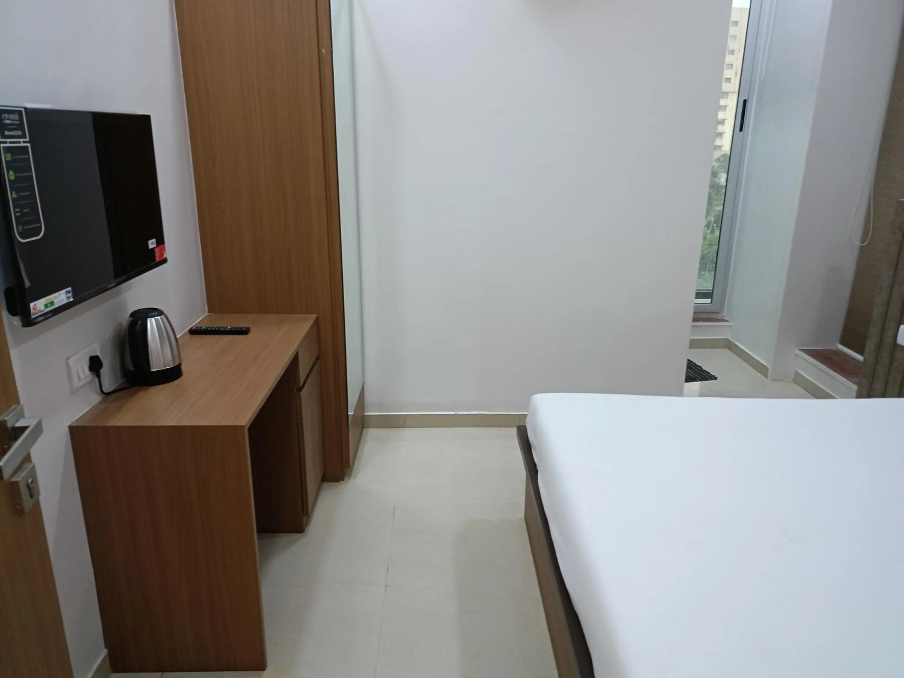 Bed in Hotel Ritz Vesu - Hotels in Vesu, Surat