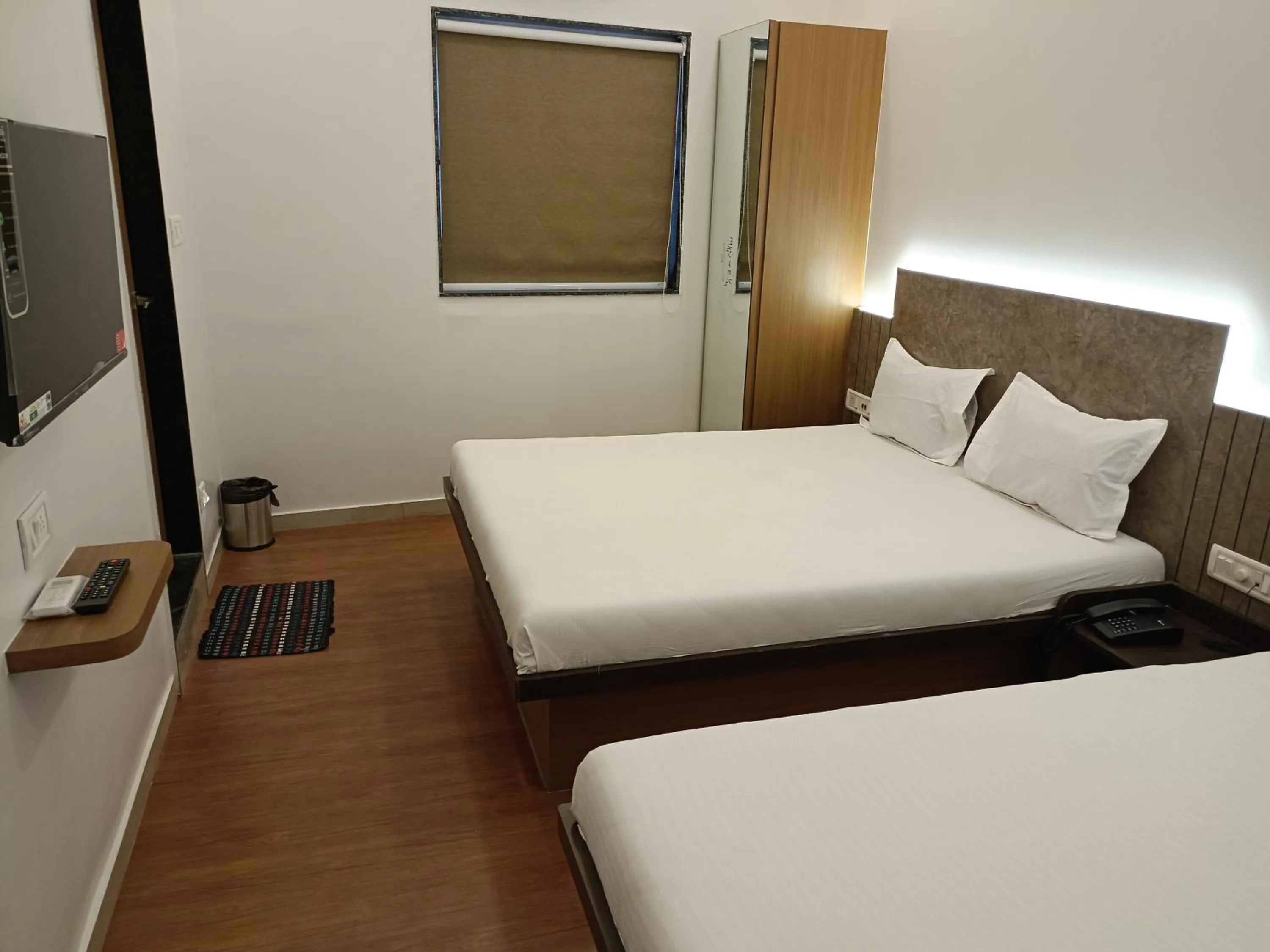 Bed in Hotel Ritz Vesu - Hotels in Vesu, Surat