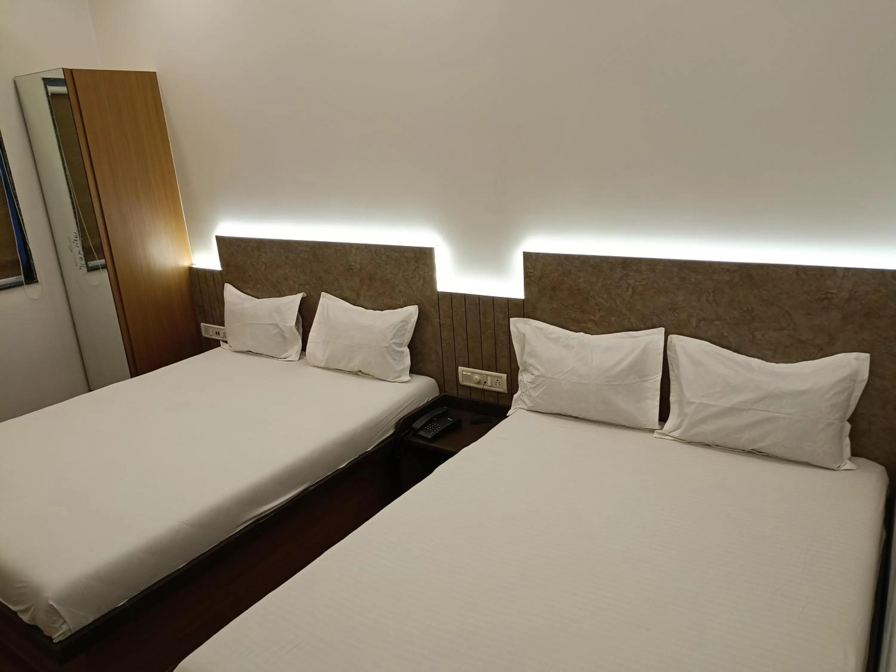 Bedroom, Bed in Hotel Ritz Vesu - Hotels in Vesu, Surat