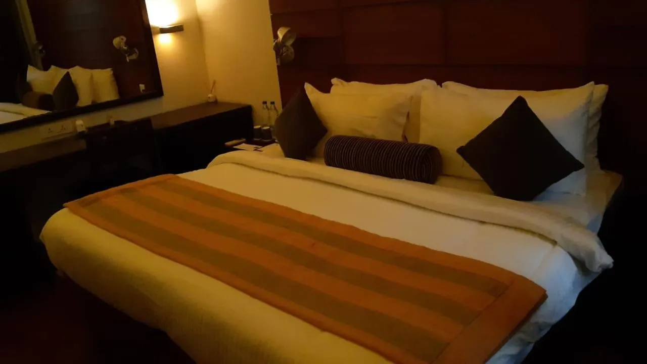 Bed in The Golkonda Resort and Spa