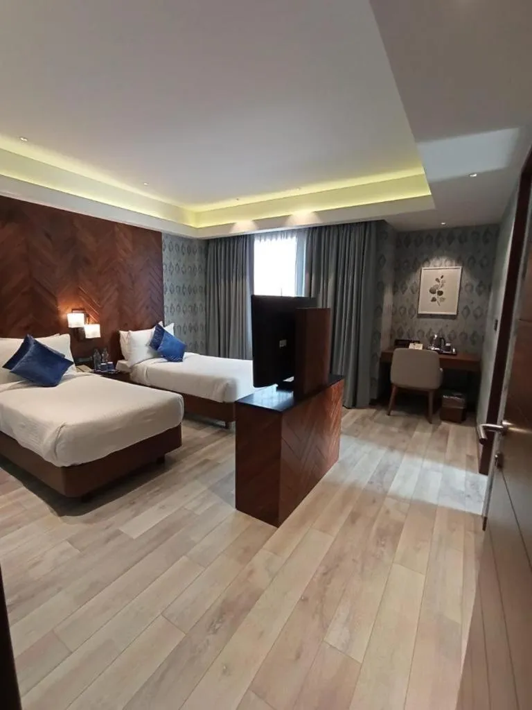 Bed in The Golkonda Resort and Spa