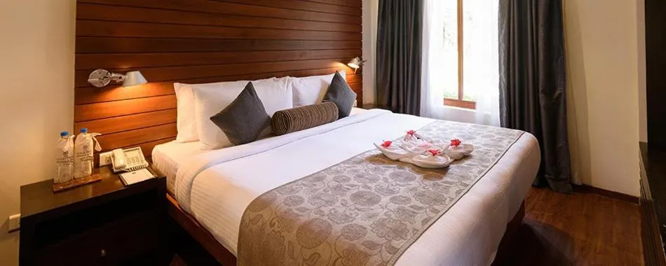 Bed in The Golkonda Resort and Spa