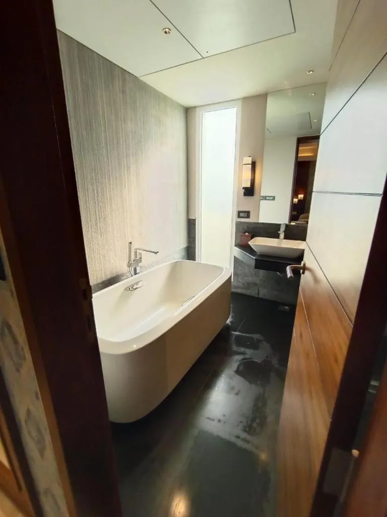 Bathroom, Bed in The Golkonda Resort and Spa