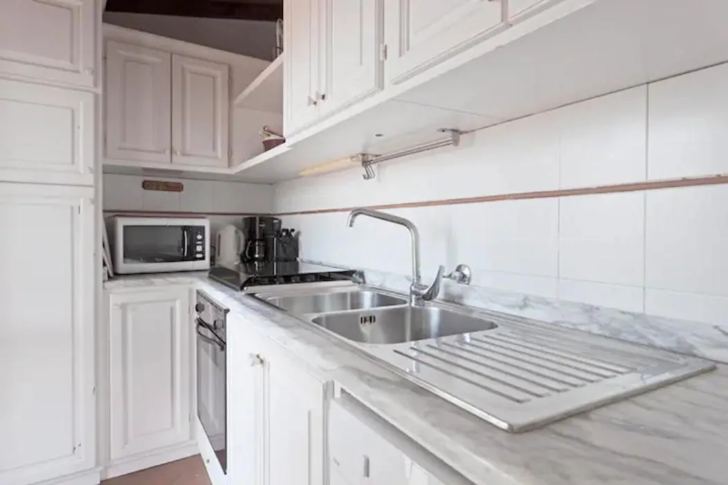 kitchen in La Favilletta Casa Vacanze