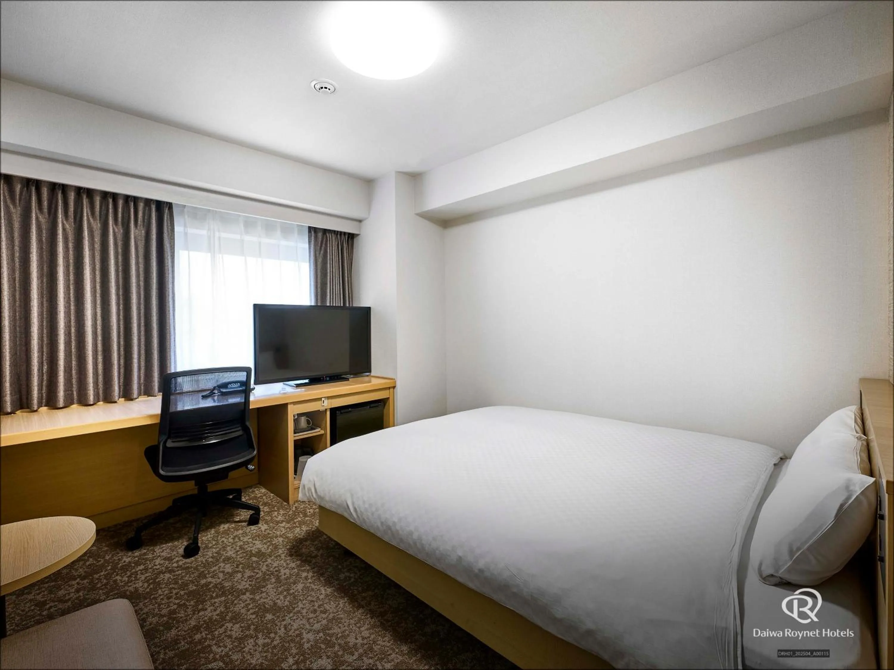 Bed in Daiwa Roynet Hotel Morioka