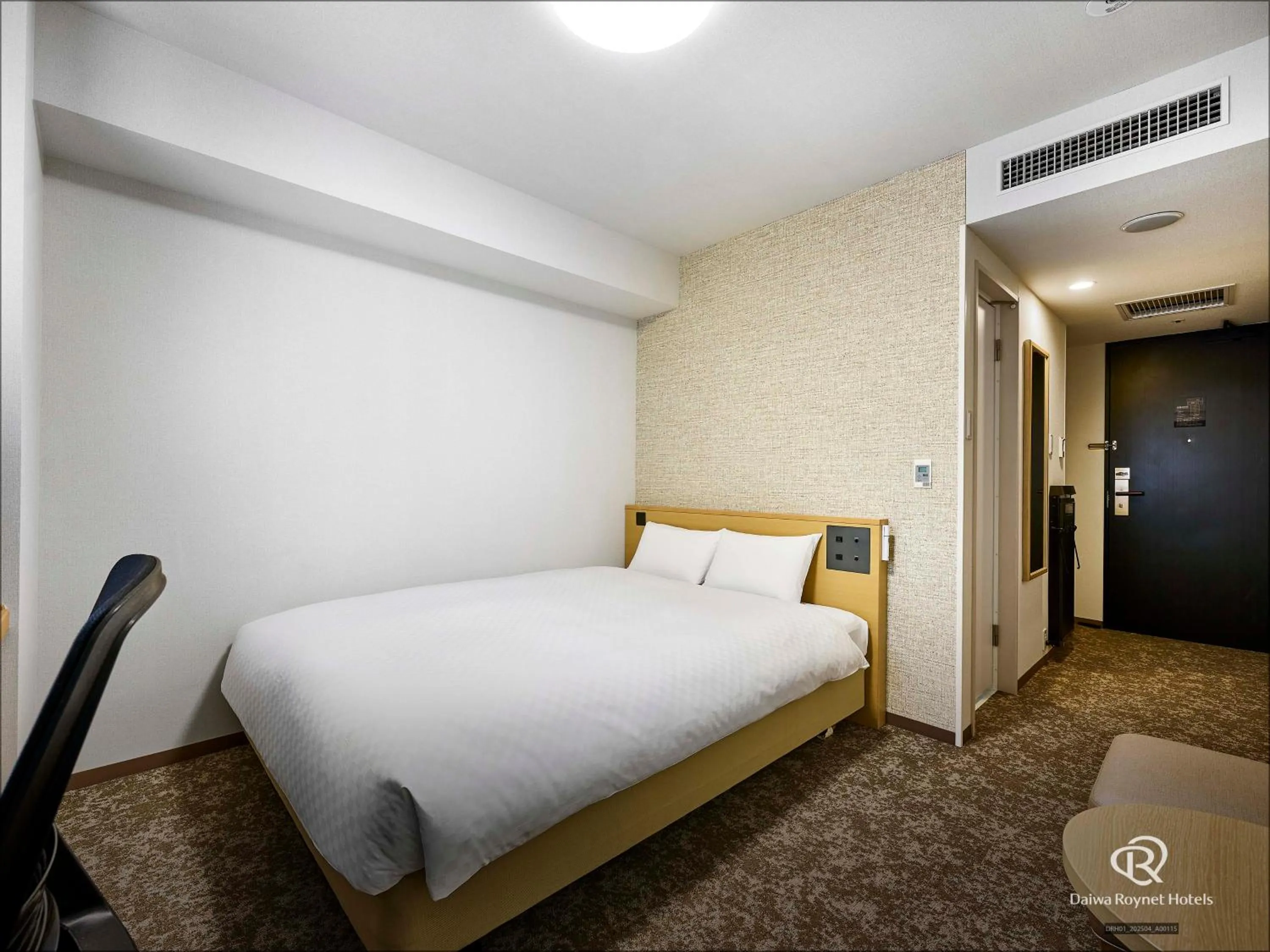 Bed in Daiwa Roynet Hotel Morioka