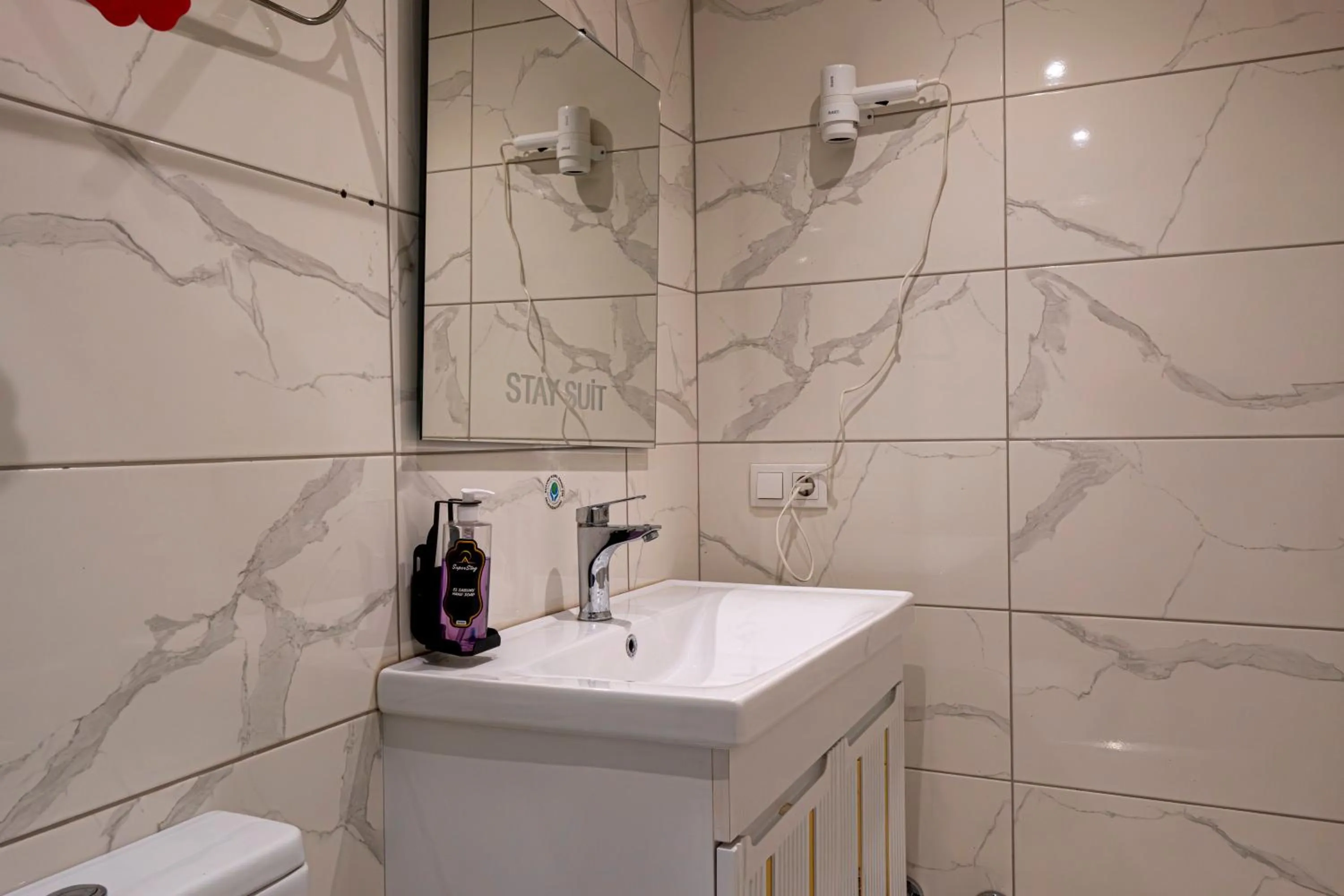 Bathroom in Stay Suite Hotel