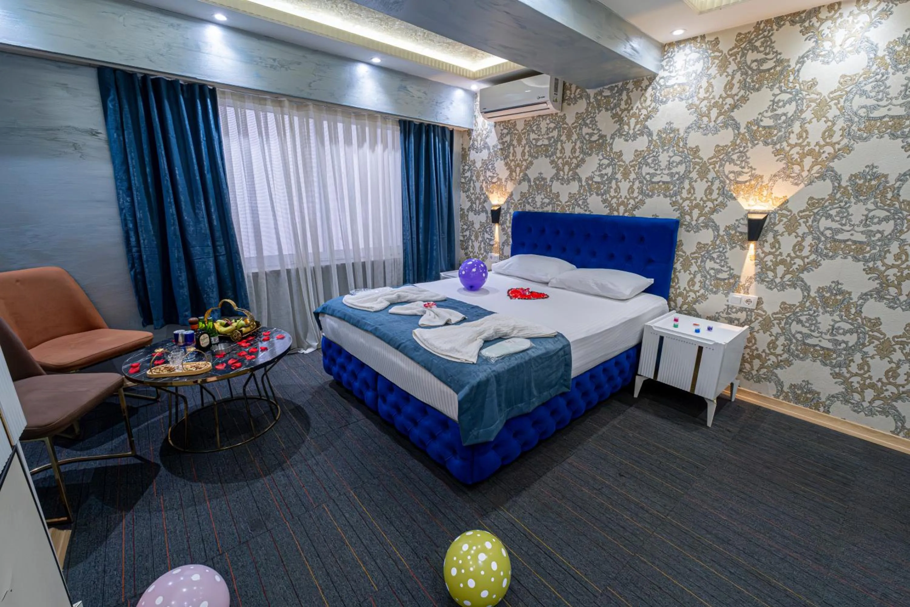 Bed in Stay Suite Hotel