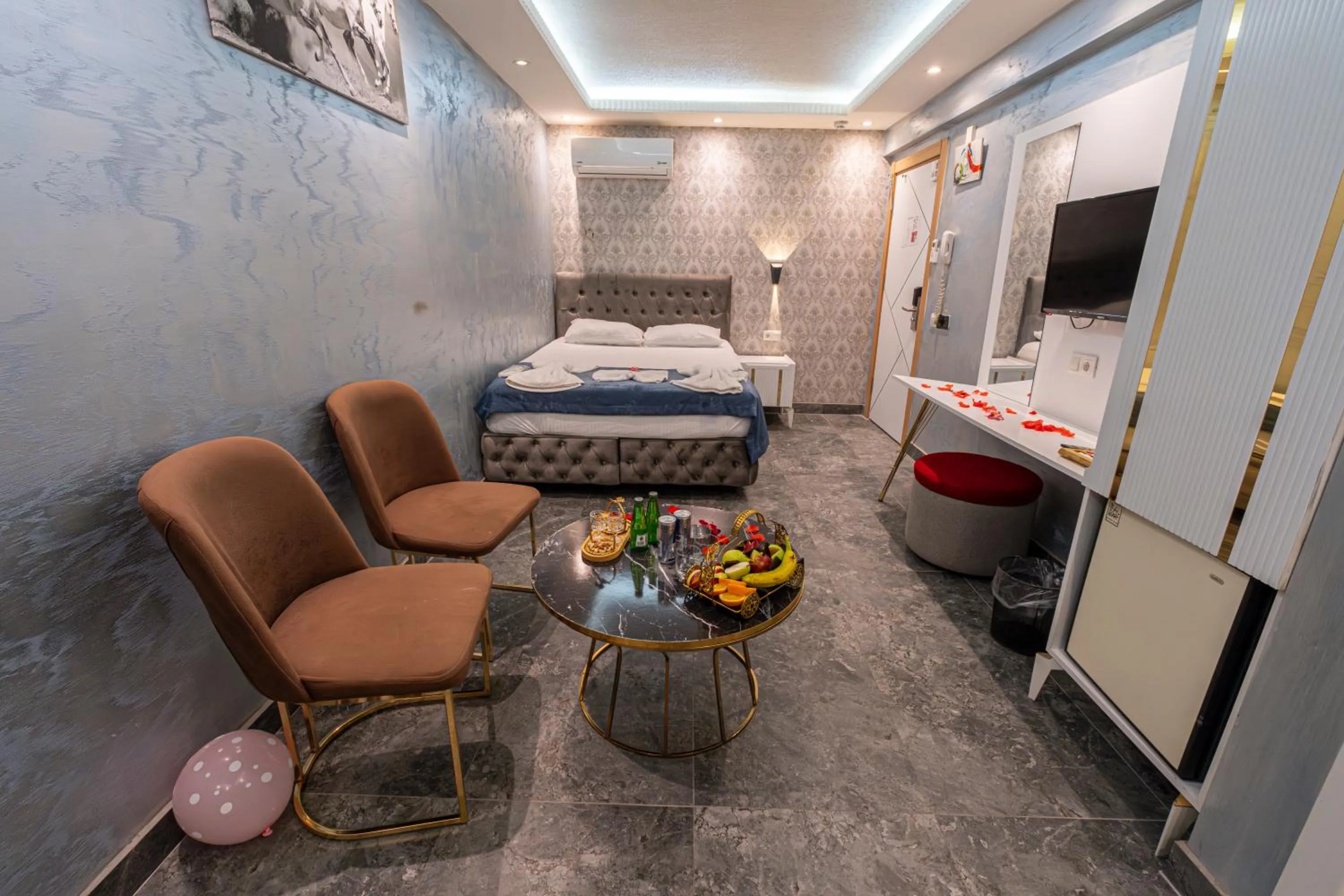 Bed in Stay Suite Hotel