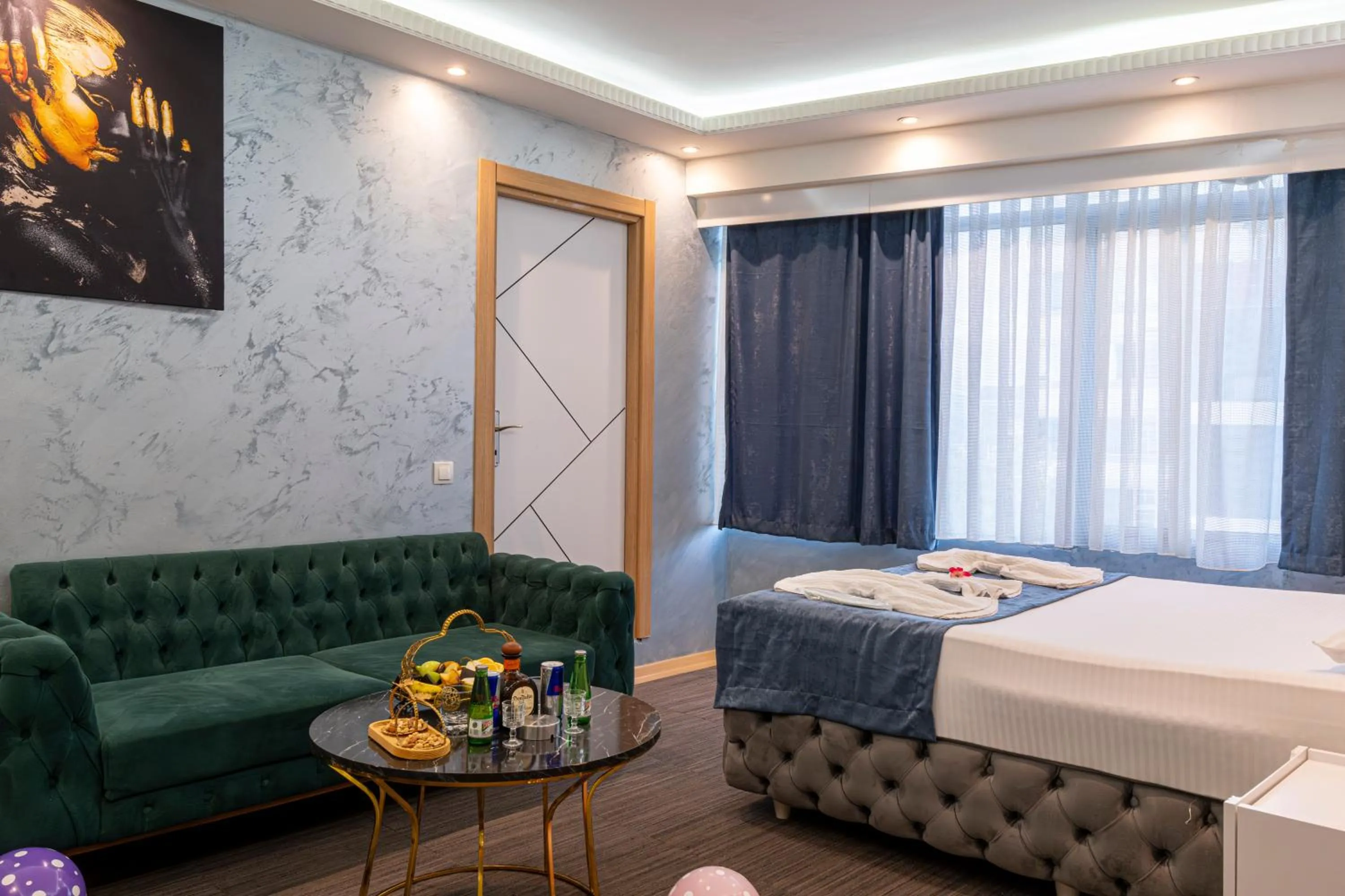 Bed in Stay Suite Hotel