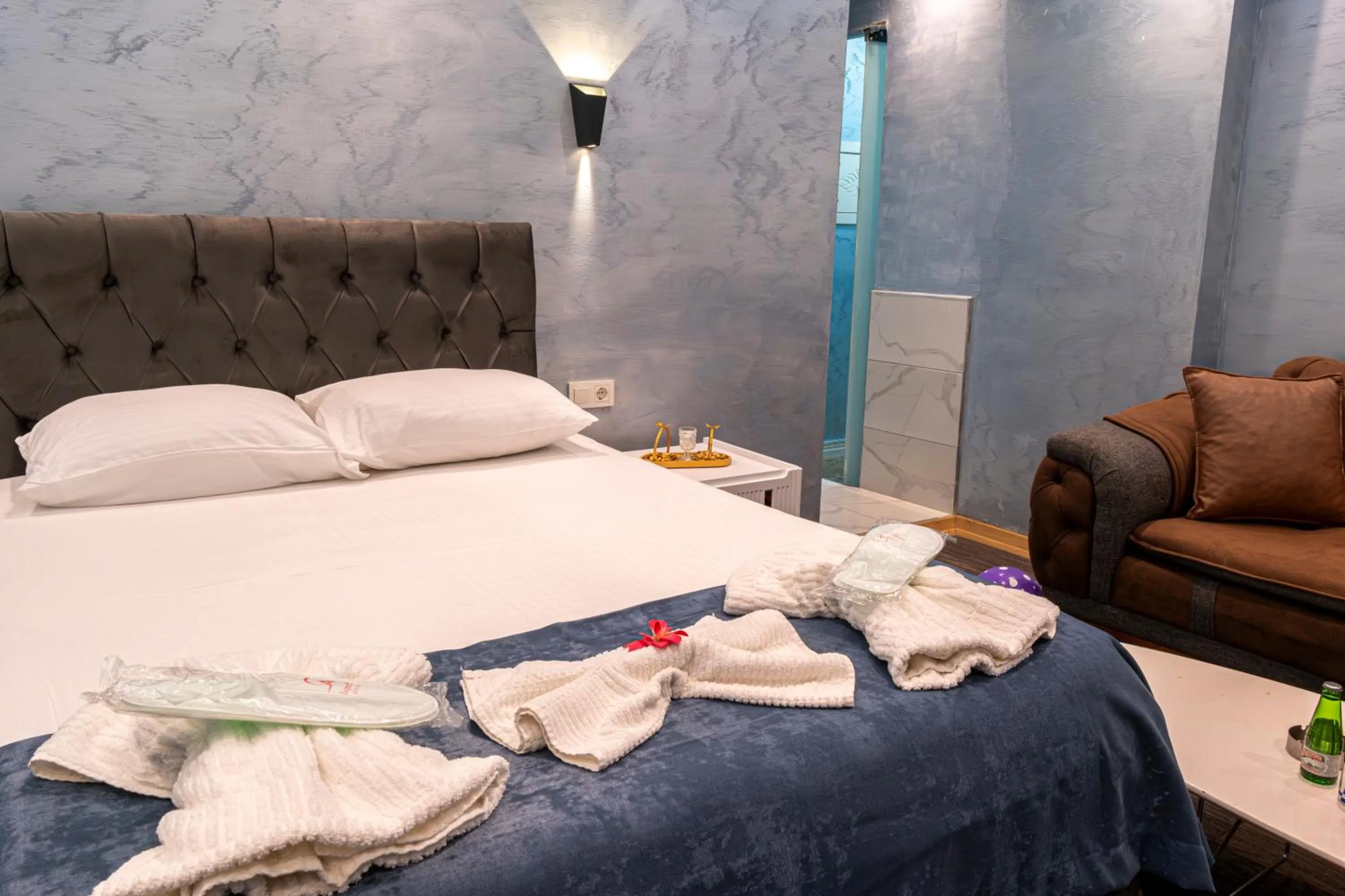 Bed in Stay Suite Hotel