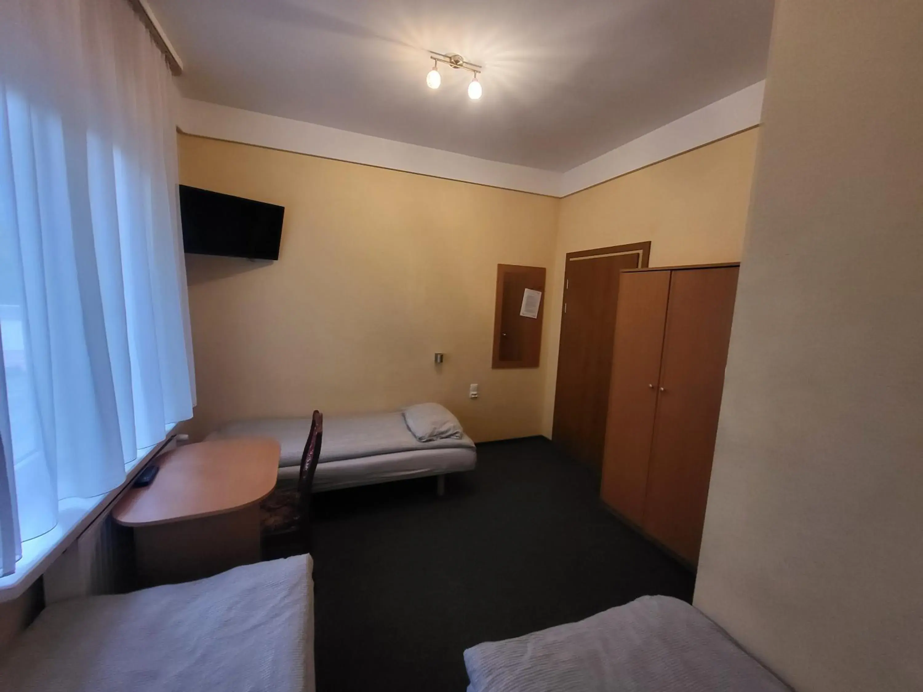 Quadruple Room with Private Bathroom in Hotel Parkowy Quadruple Room with Private Bathroom in Hotel Parkowy
