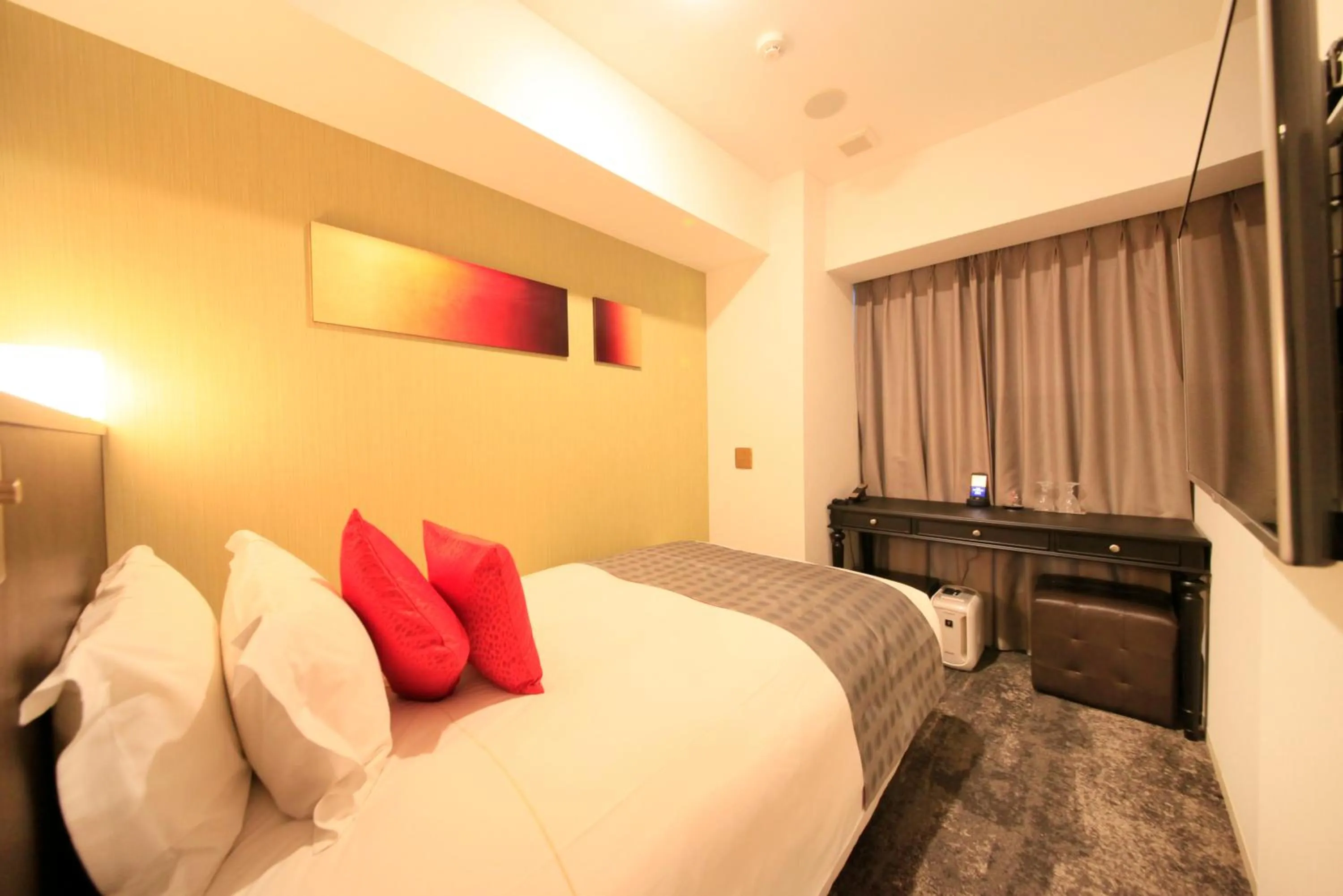 Photo of the whole room, Bed in Centurion Hotel Ikebukuro Station