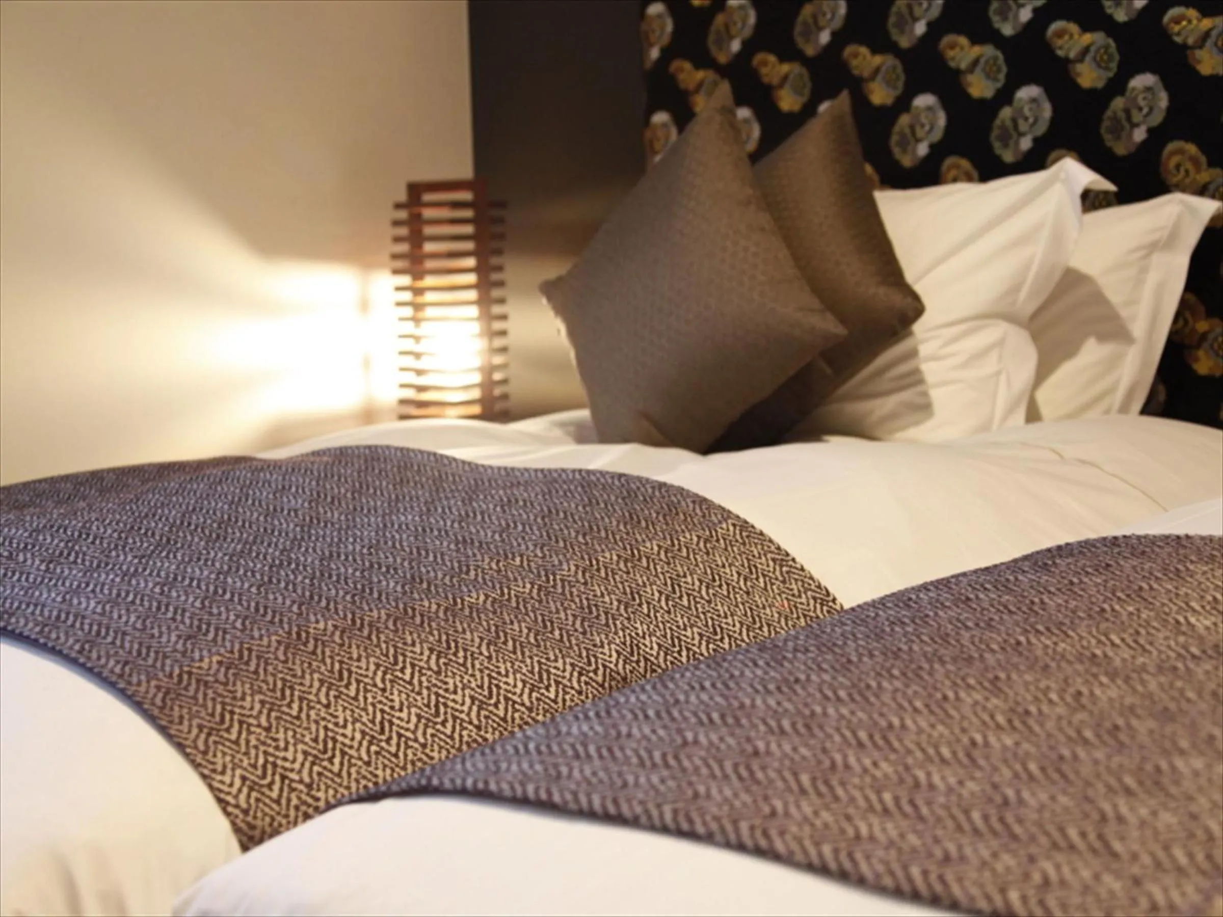 Bed in Centurion Hotel Ikebukuro Station