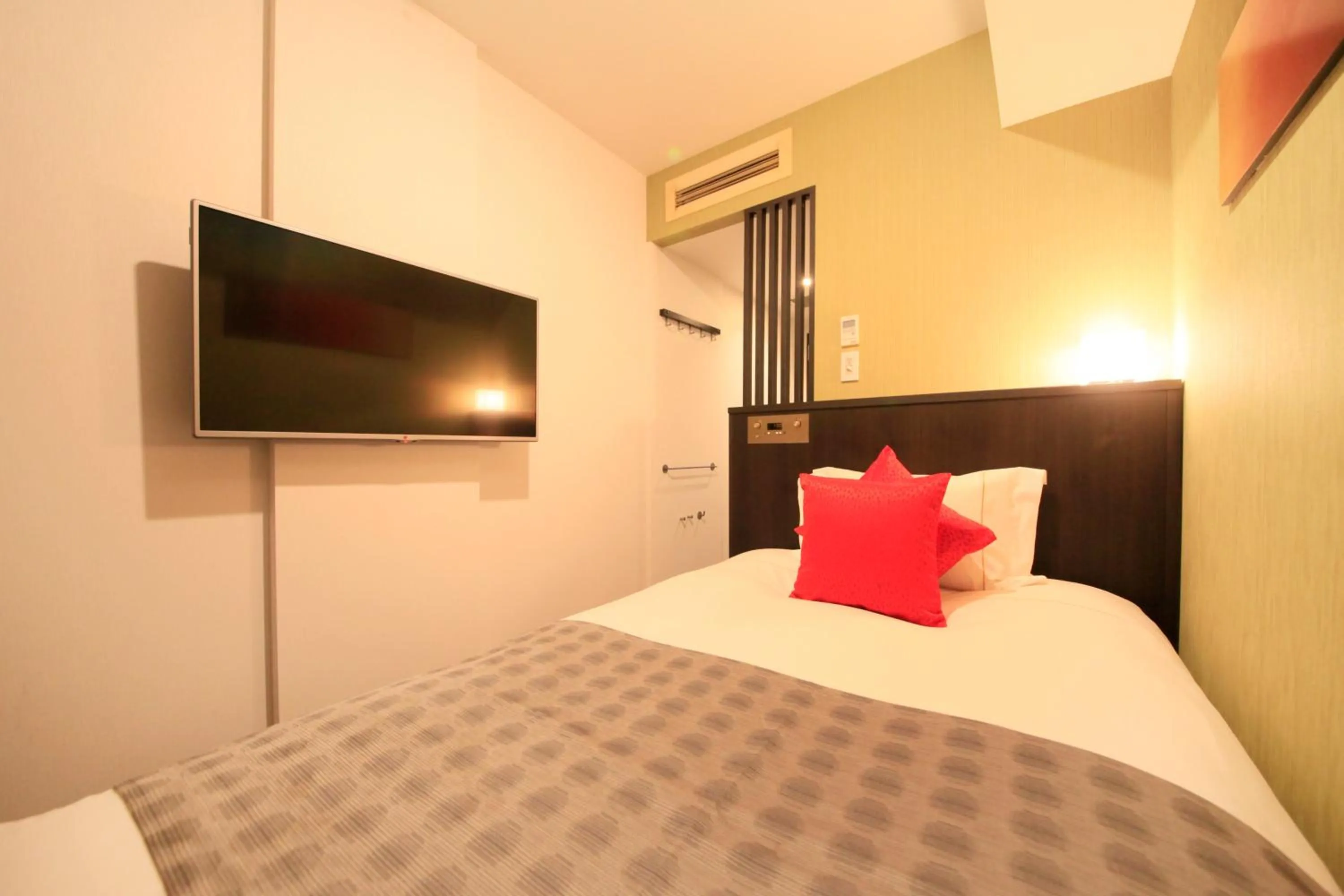 Photo of the whole room, Bed in Centurion Hotel Ikebukuro Station