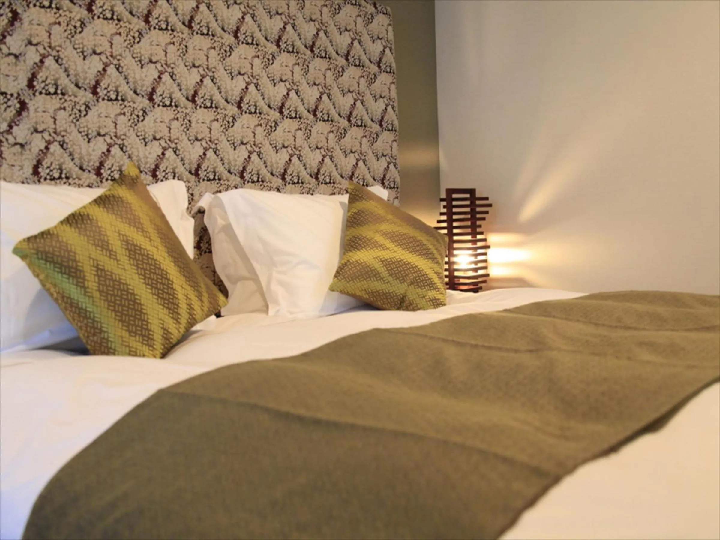 Bed in Centurion Hotel Ikebukuro Station