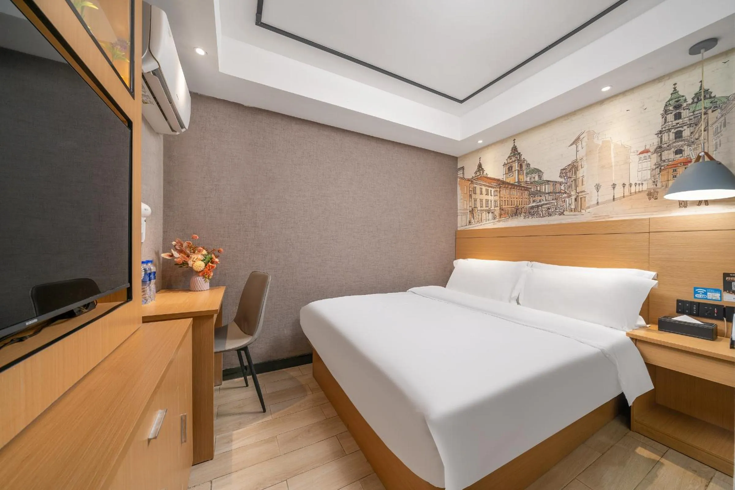 Bed in Yi Nuo Hotel Guangzhou