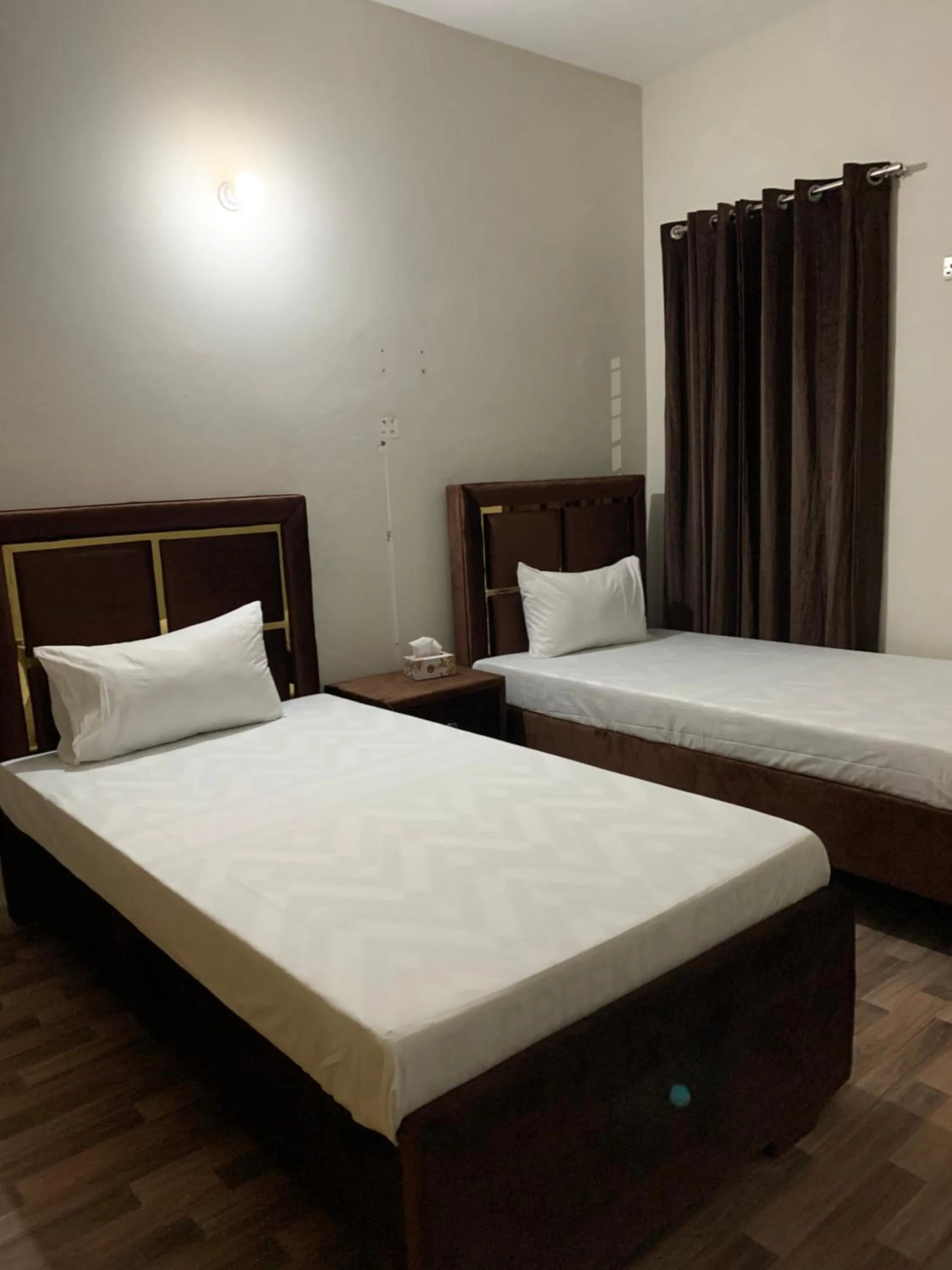 Bed in Eden Plus Executive Hotel