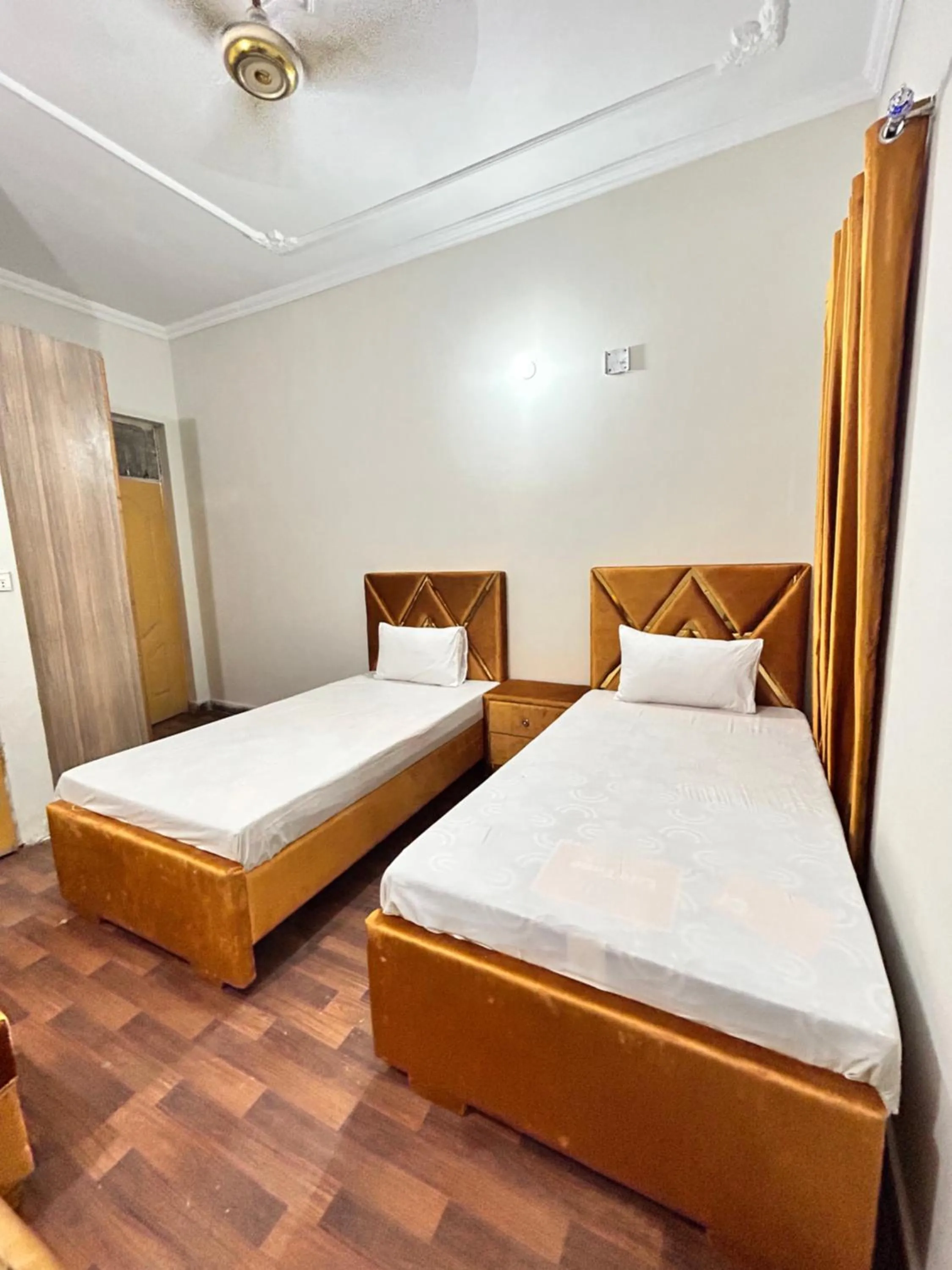 Bed in Eden Plus Executive Hotel