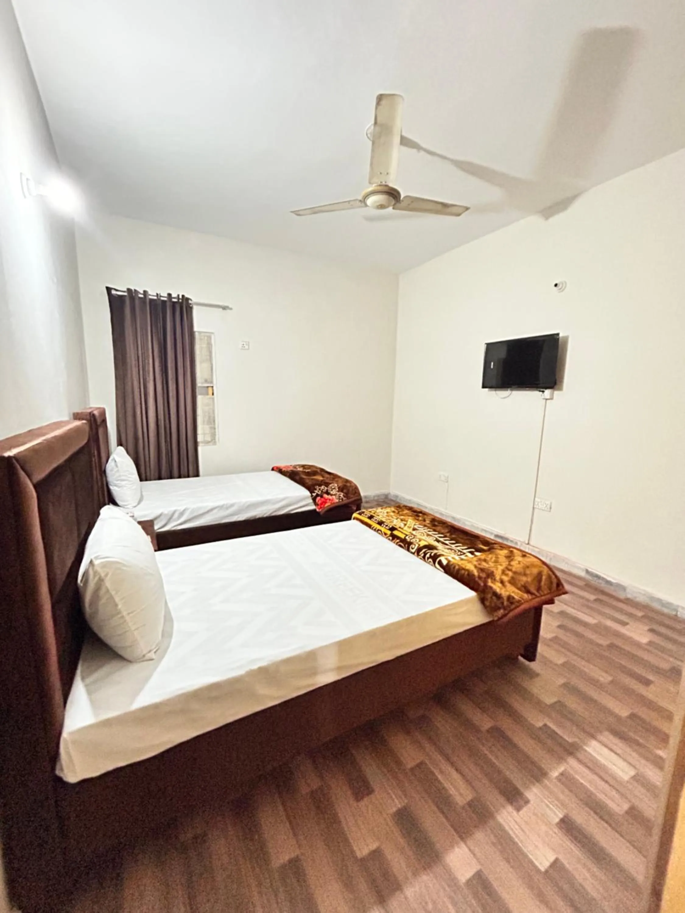 Bed in Eden Plus Executive Hotel