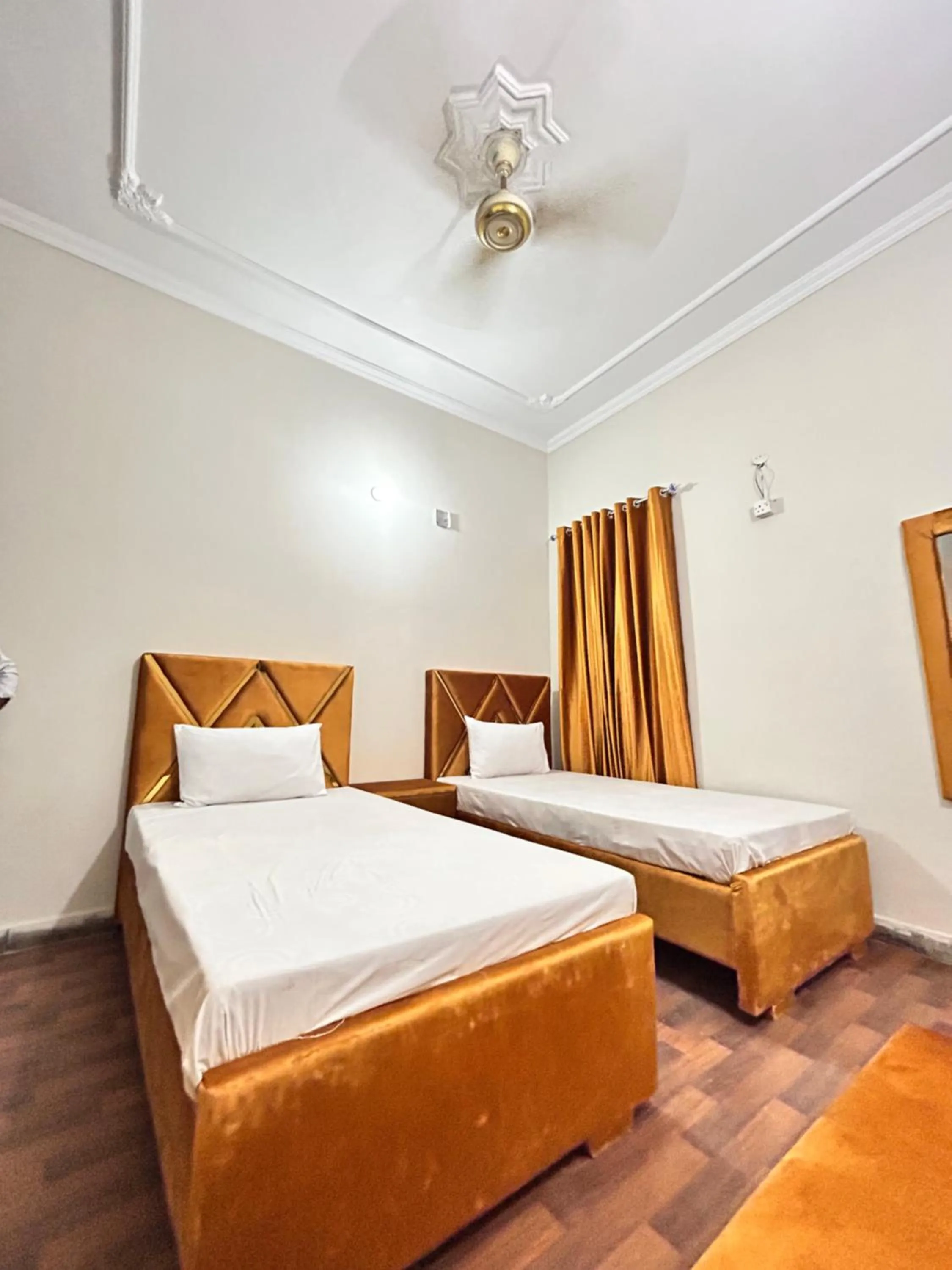 Bed in Eden Plus Executive Hotel