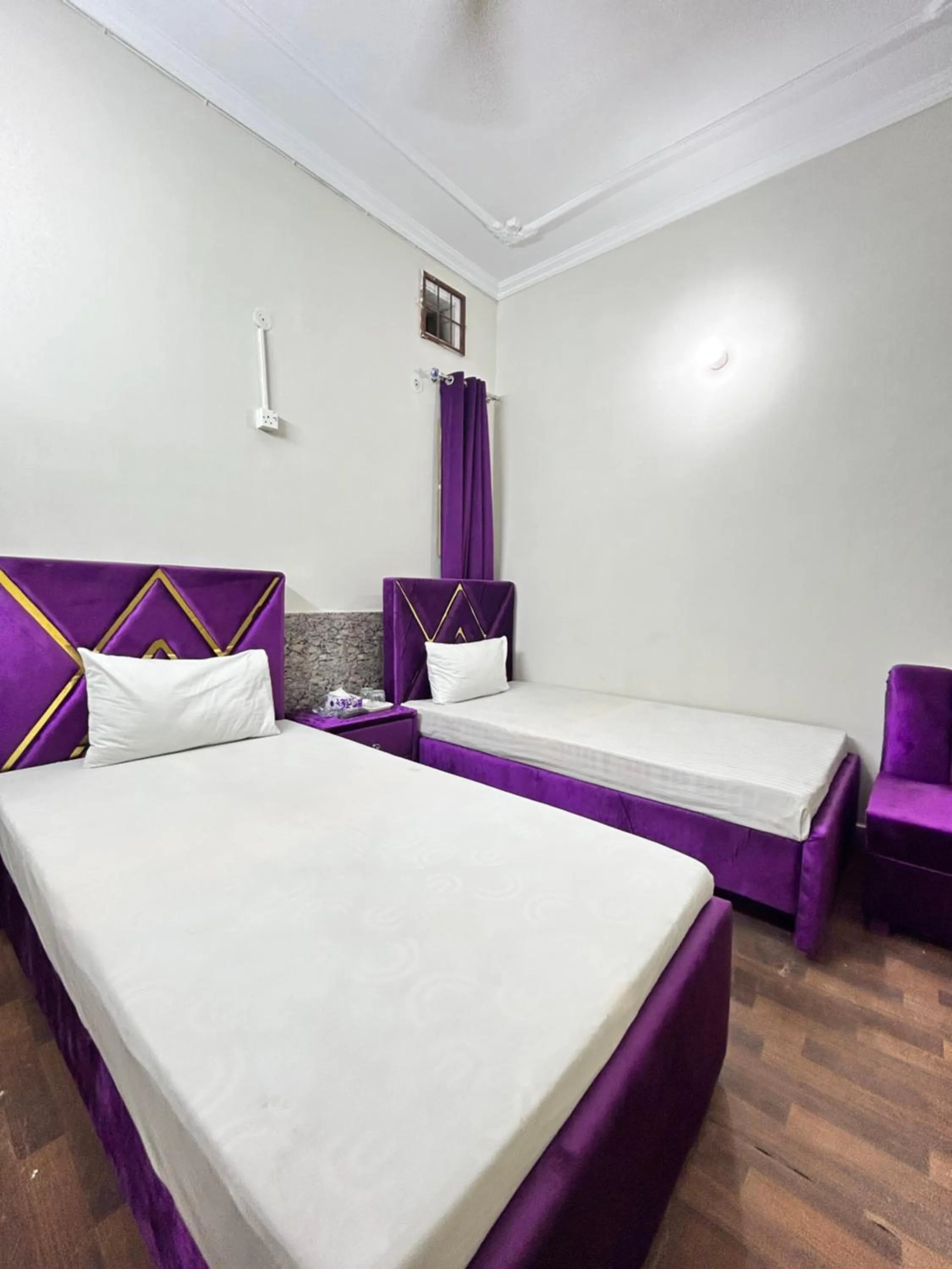 Bed in Eden Plus Executive Hotel