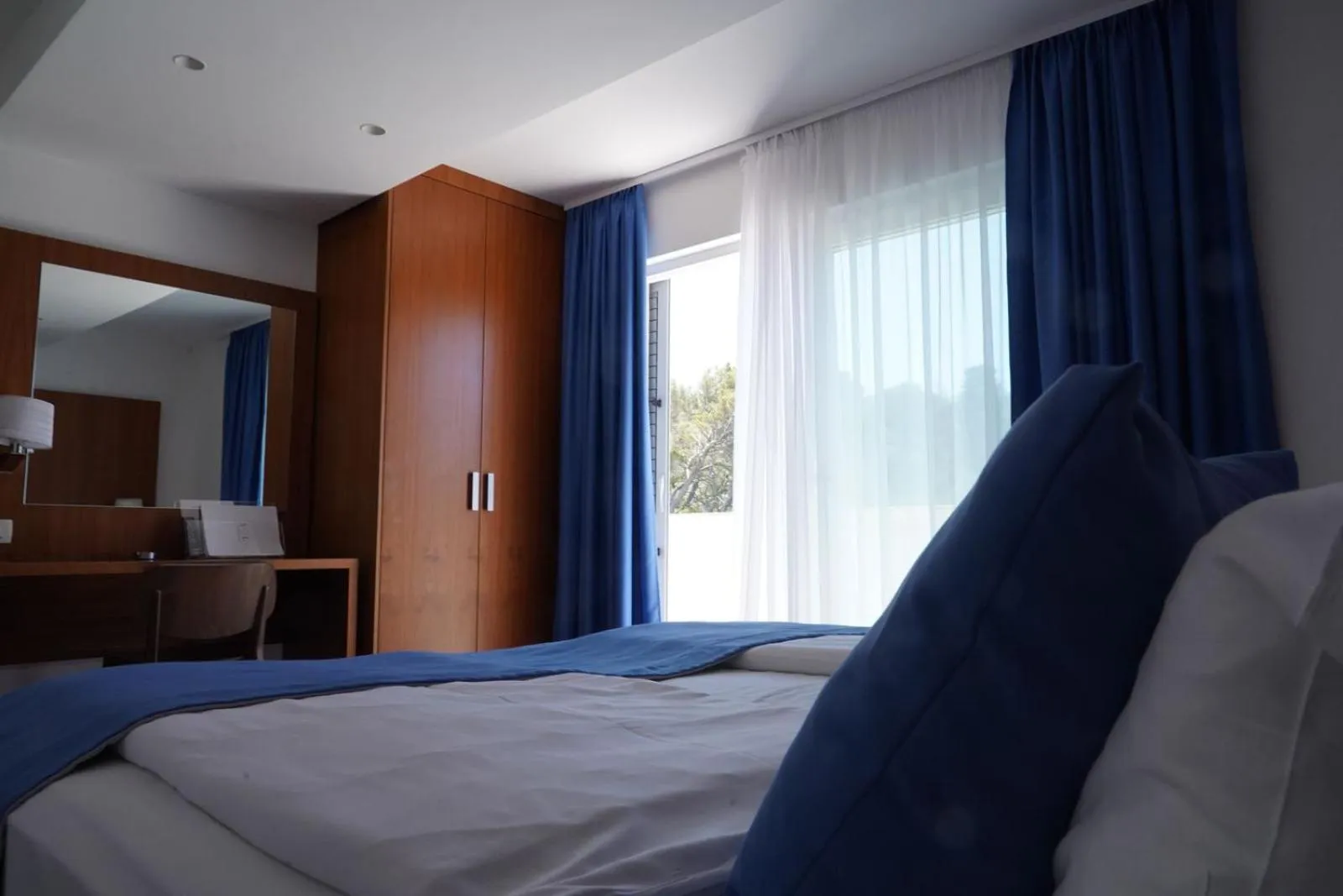 Bed in Aparthotel Miramare