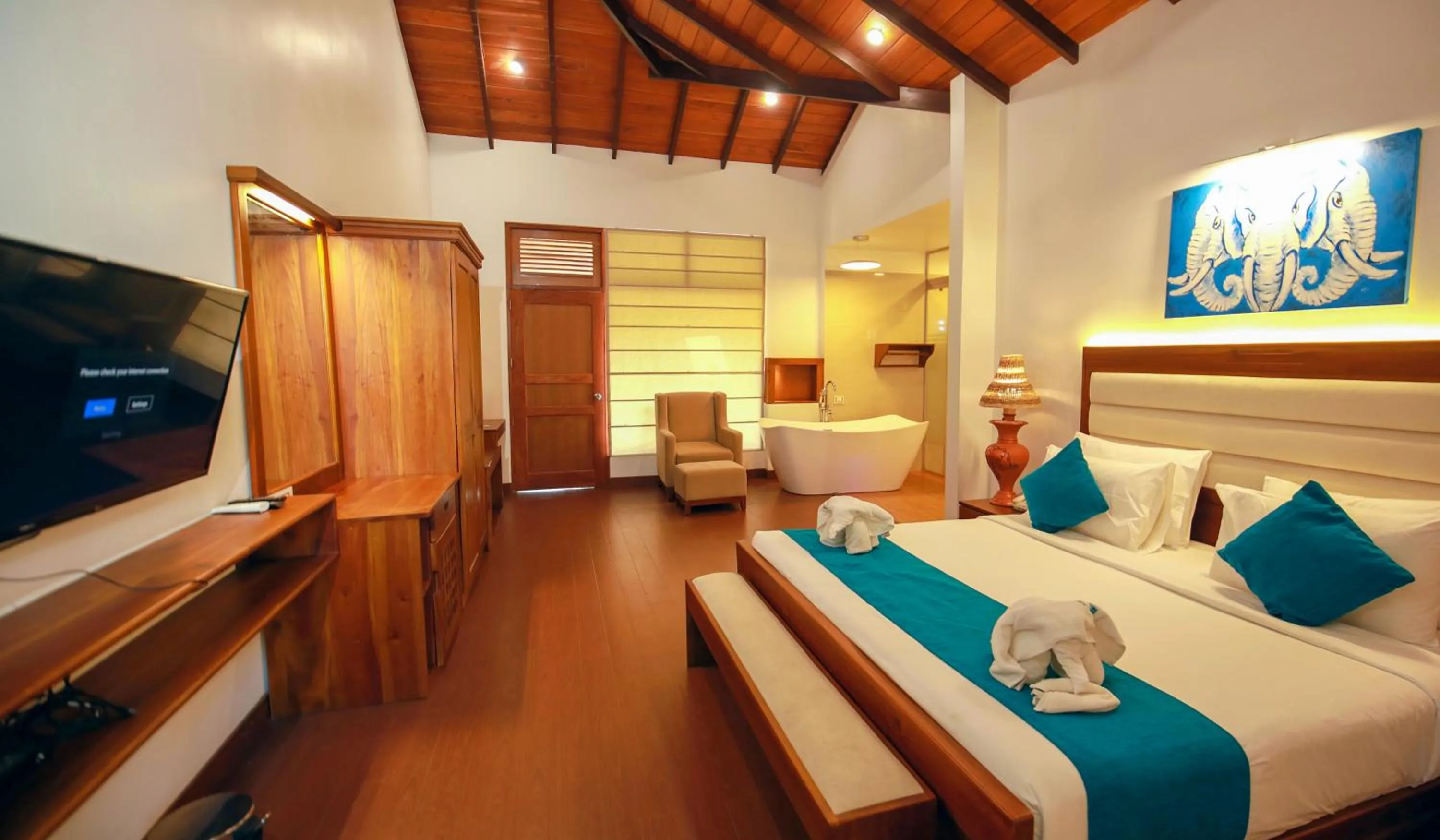 Bed in Wisdom Boutique Resort