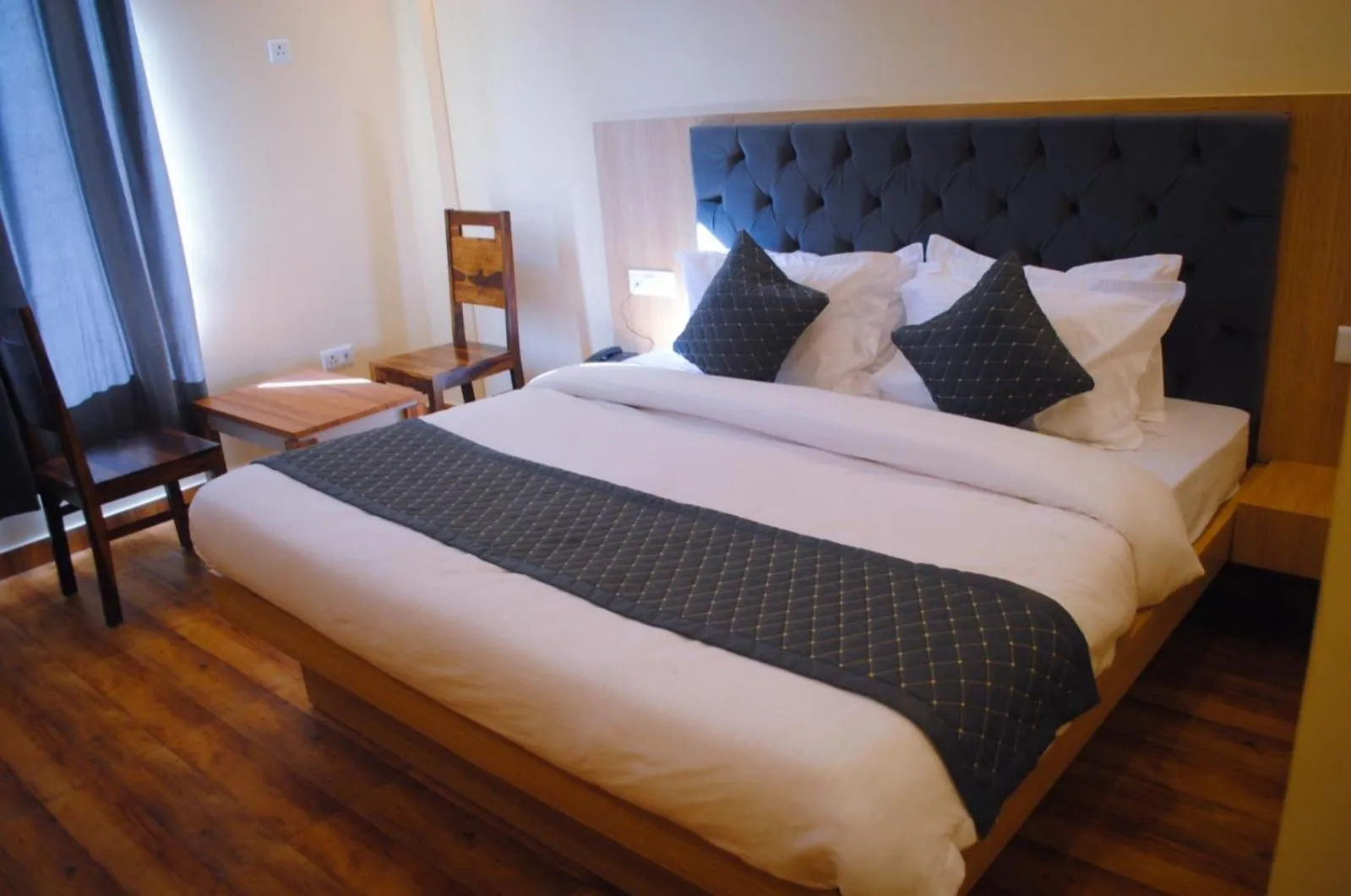 Bed in The Fragrance Hotel