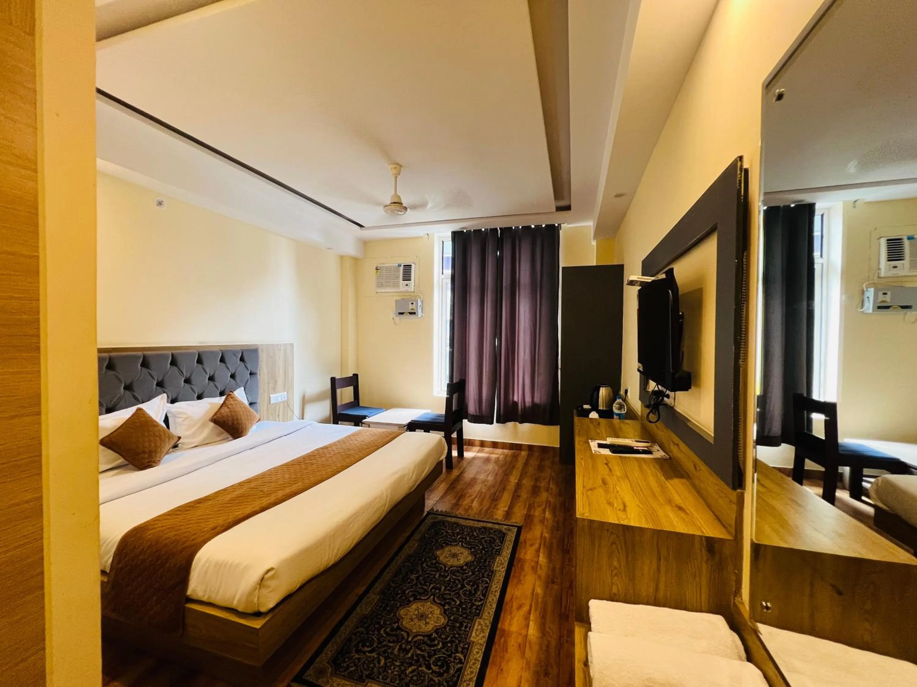 Communal lounge/ TV room, Bed in The Fragrance Hotel