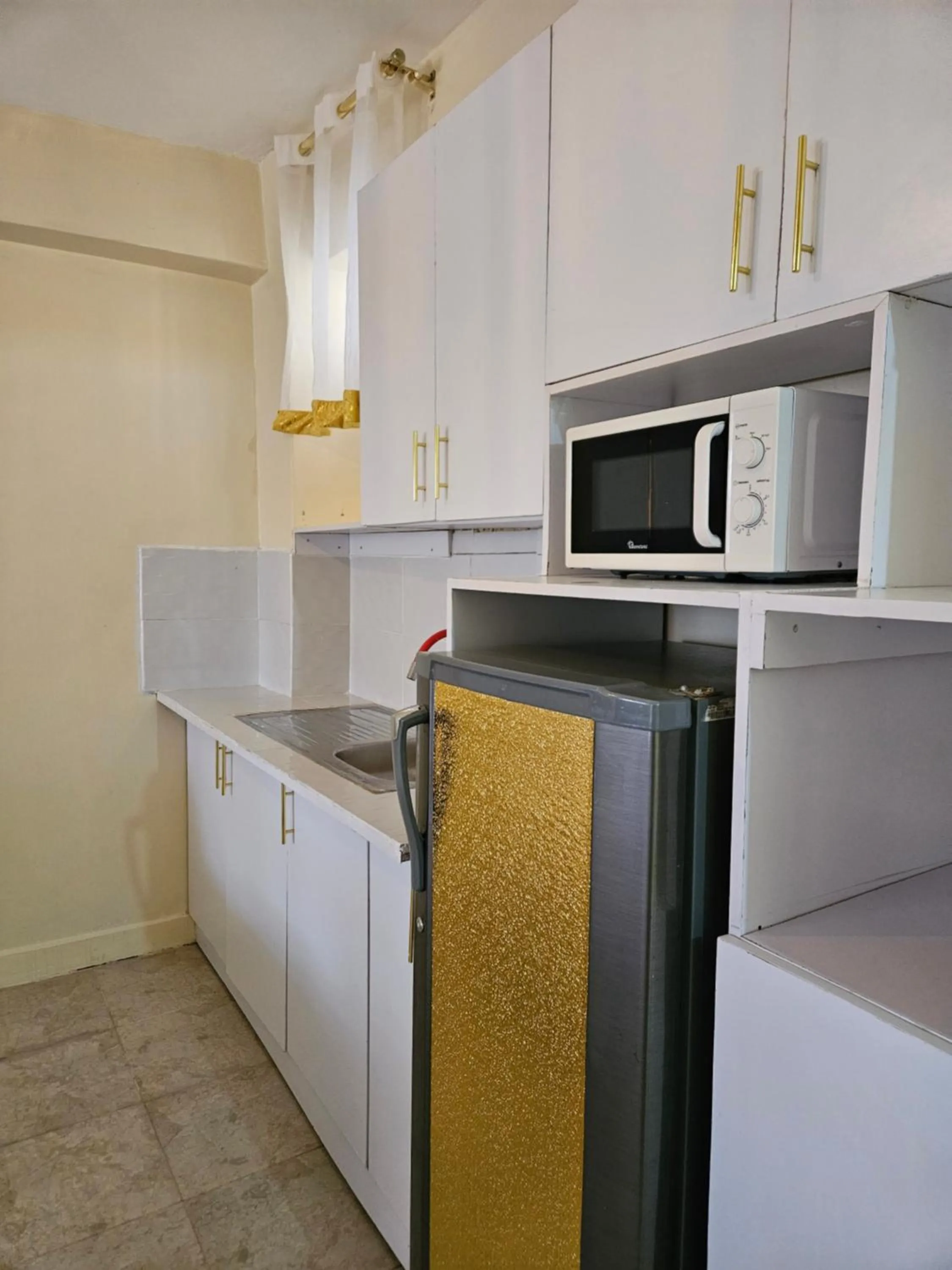 Kitchen or kitchenette in Airport Studio Apartments-JKIA