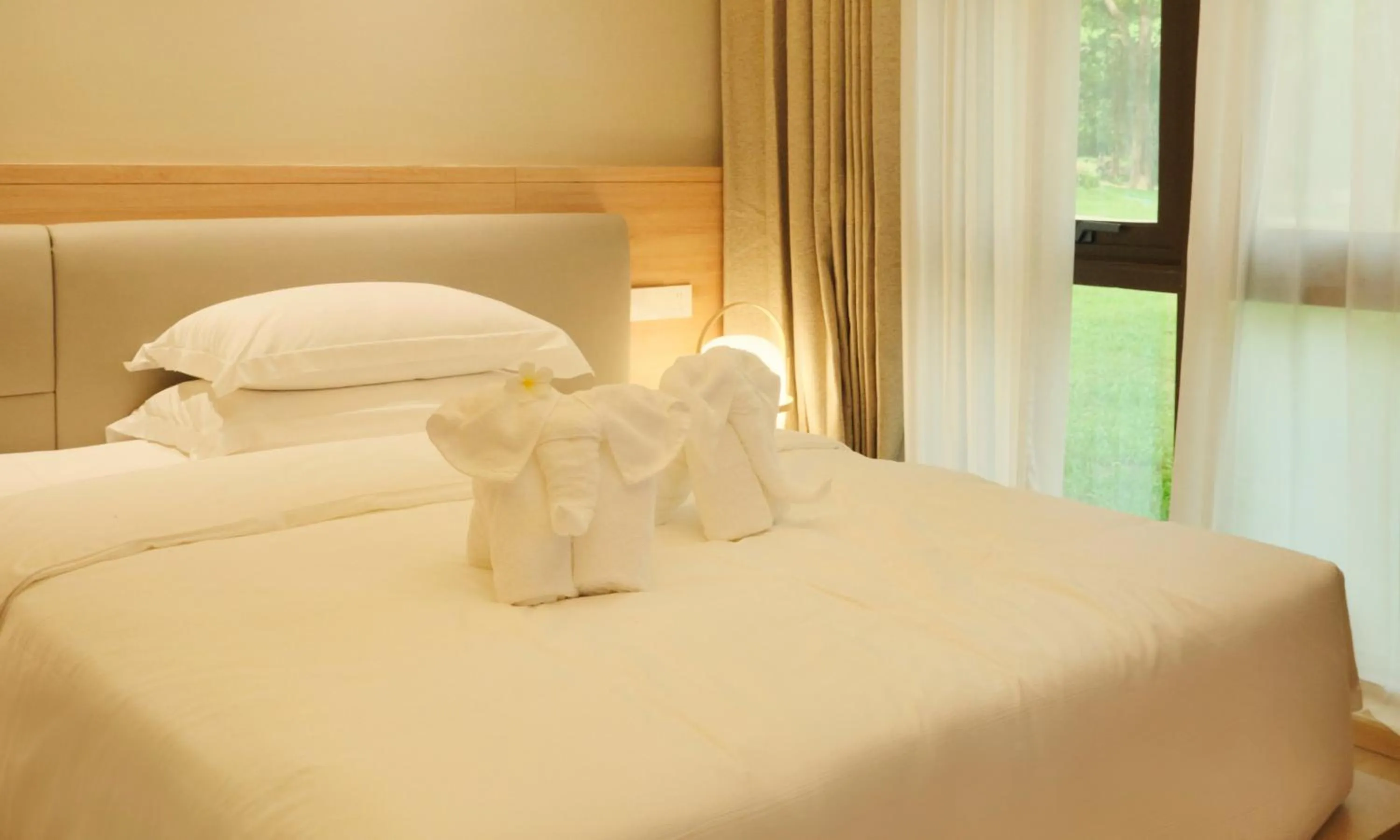 Bed in MonMonBoutique Hotel