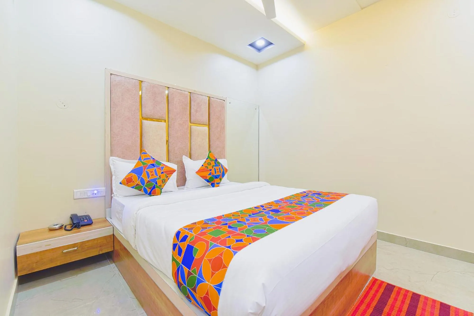 Bed in FabHotel Bohra International