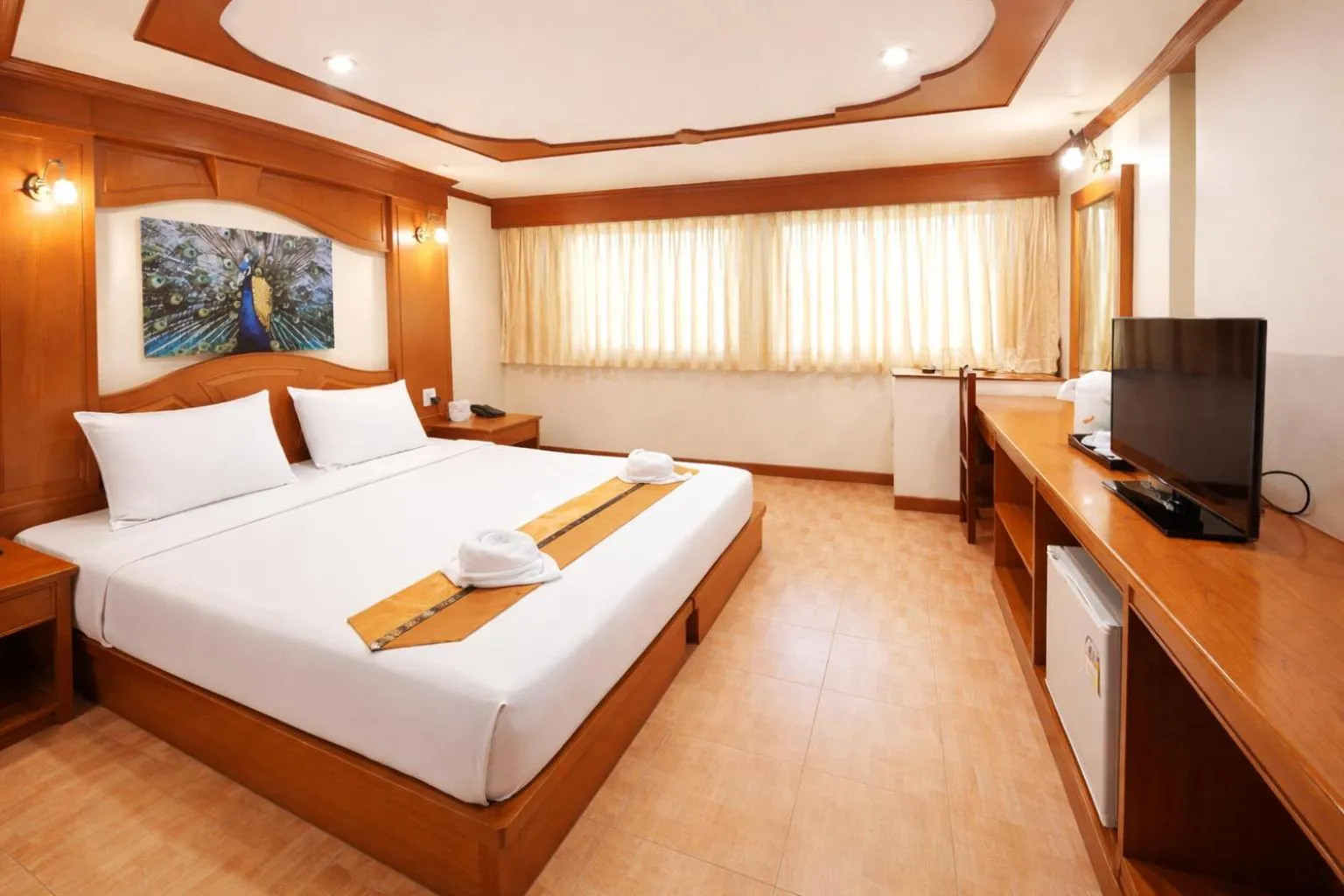 Photo of the whole room, Bed in Tiger Complex Hotel