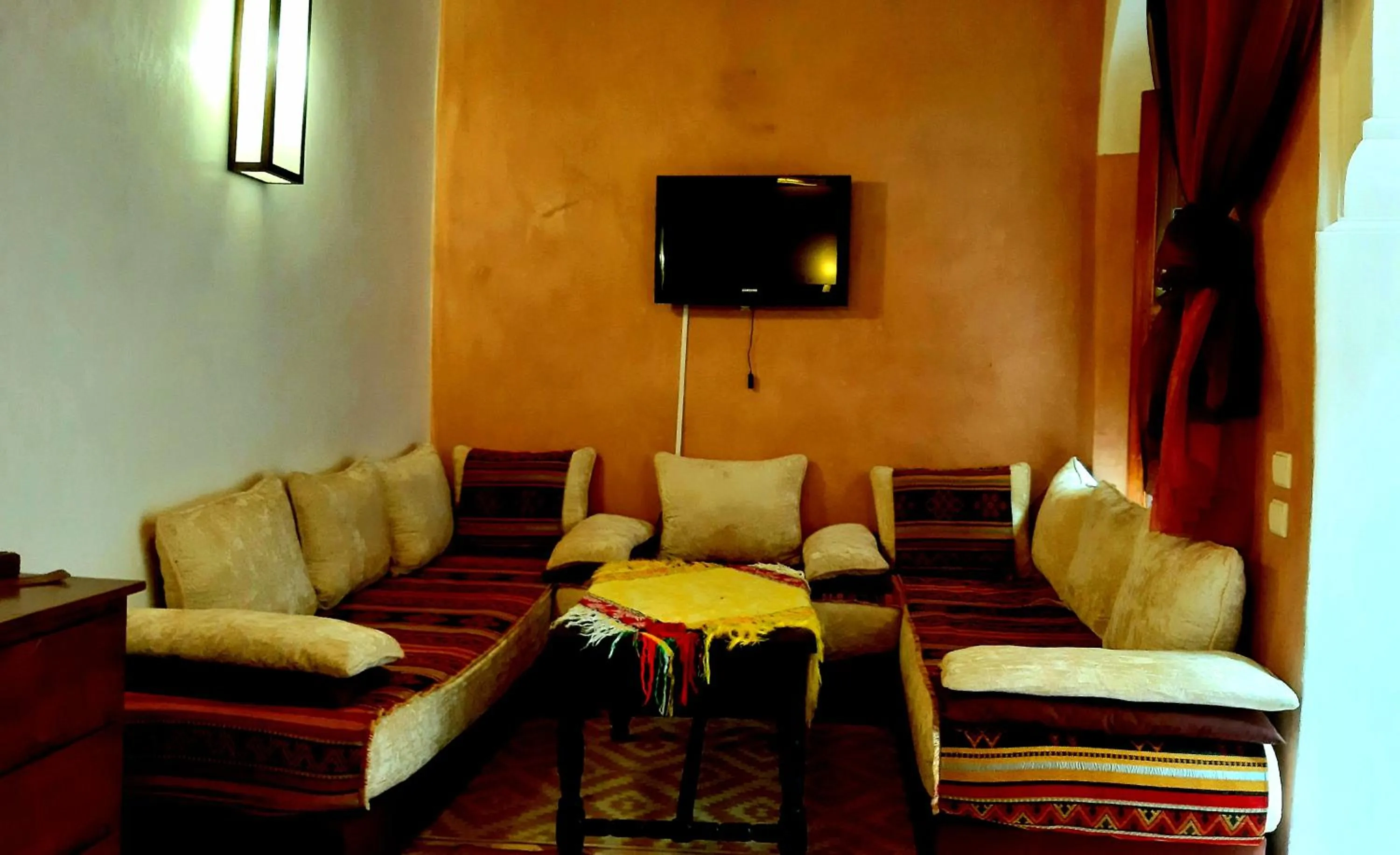 Communal lounge/ TV room in Riad Radia