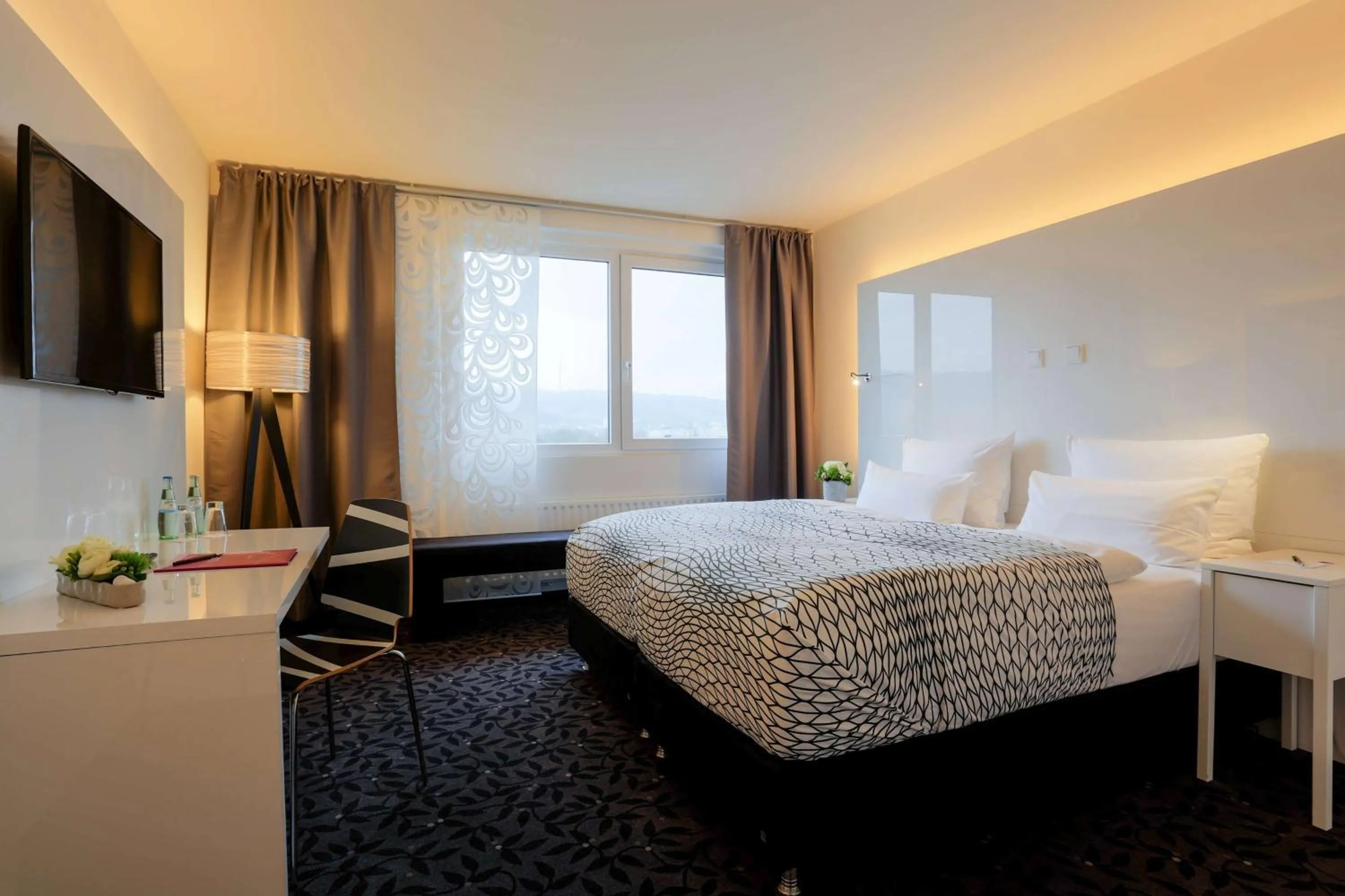 Photo of the whole room, Bed in FourSide Plaza Hotel Trier, Trademark Collection by Wyndham