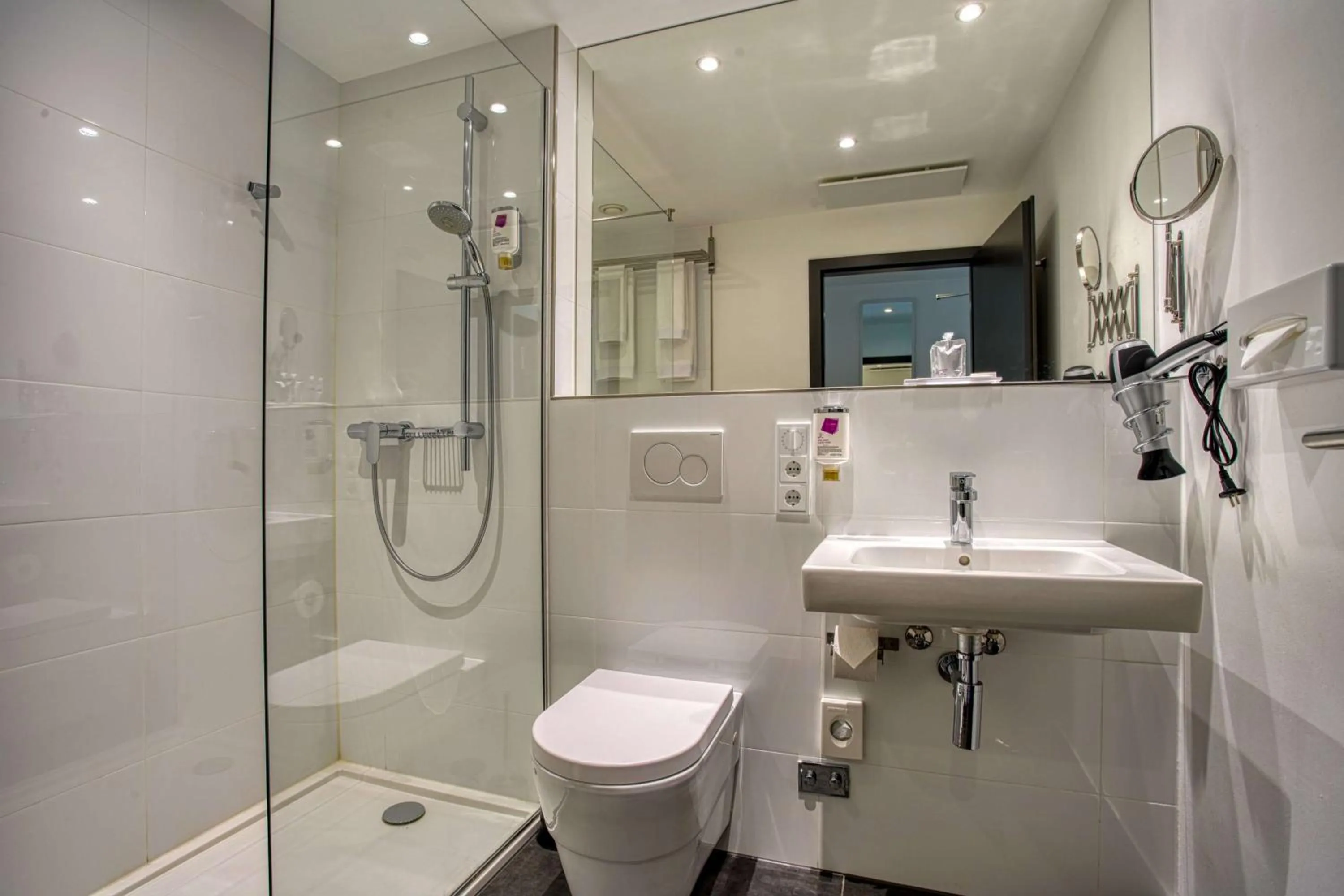 Photo of the whole room in FourSide Plaza Hotel Trier, Trademark Collection by Wyndham