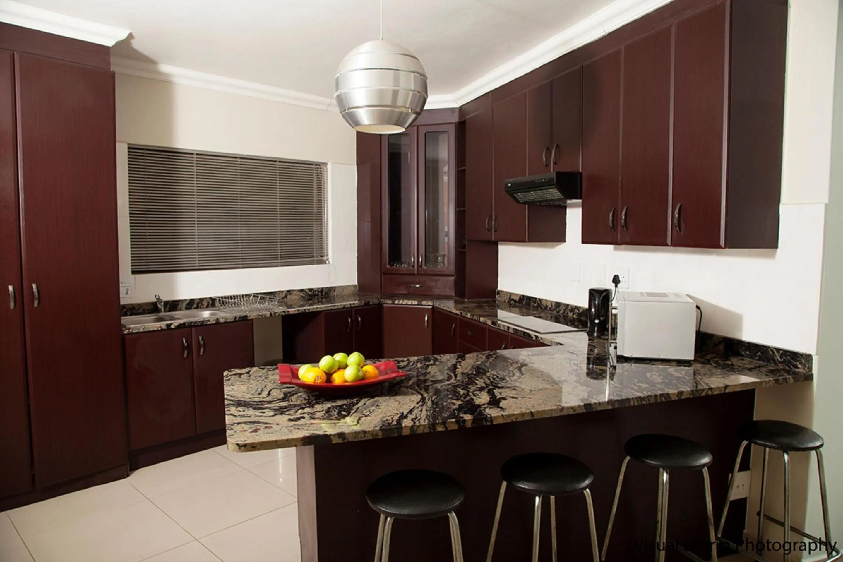 kitchen in Palm Valley Inn And Day Spa